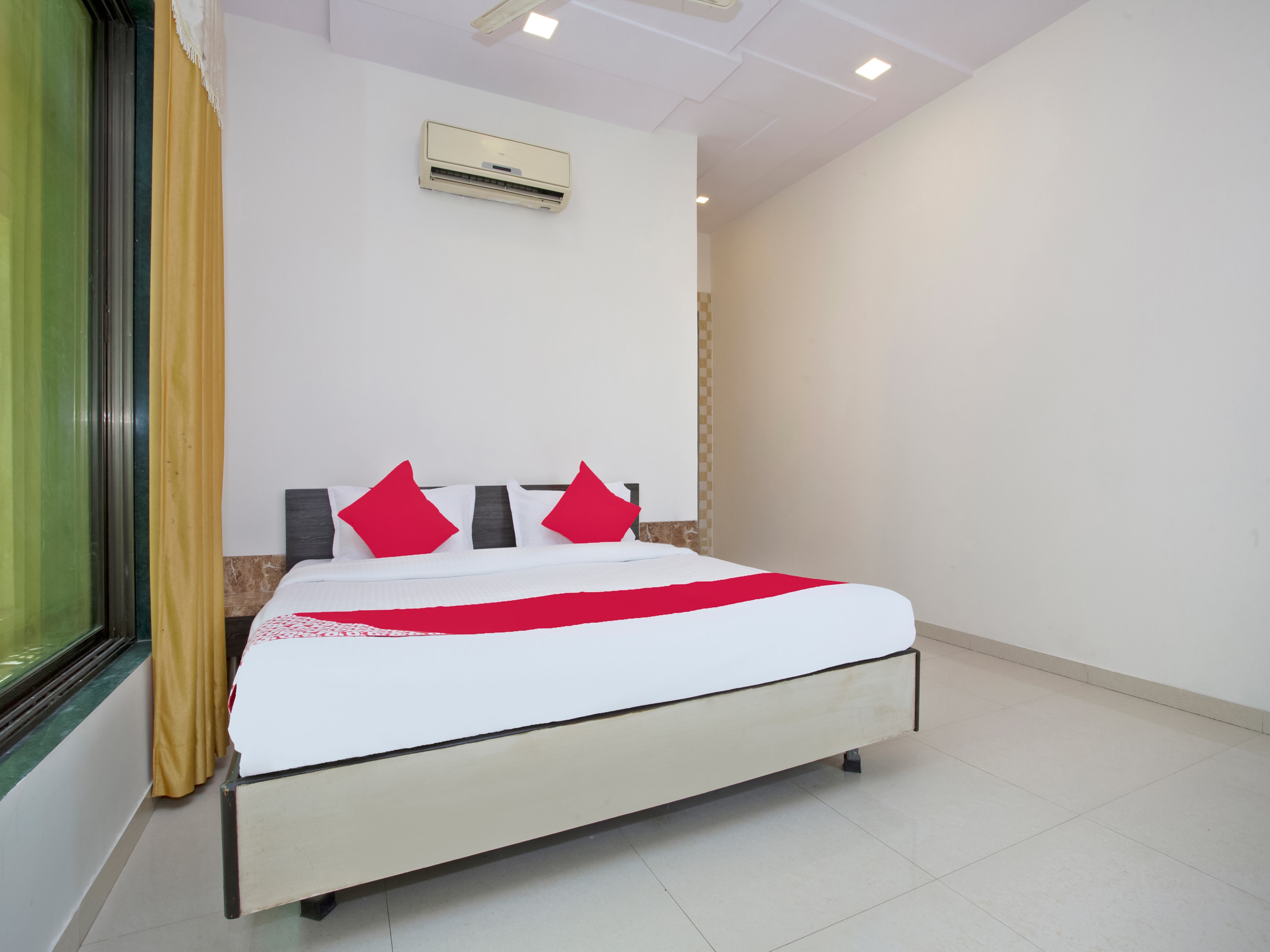 Hotel O Capital O Sai Icon Residency - Tap to explore photos