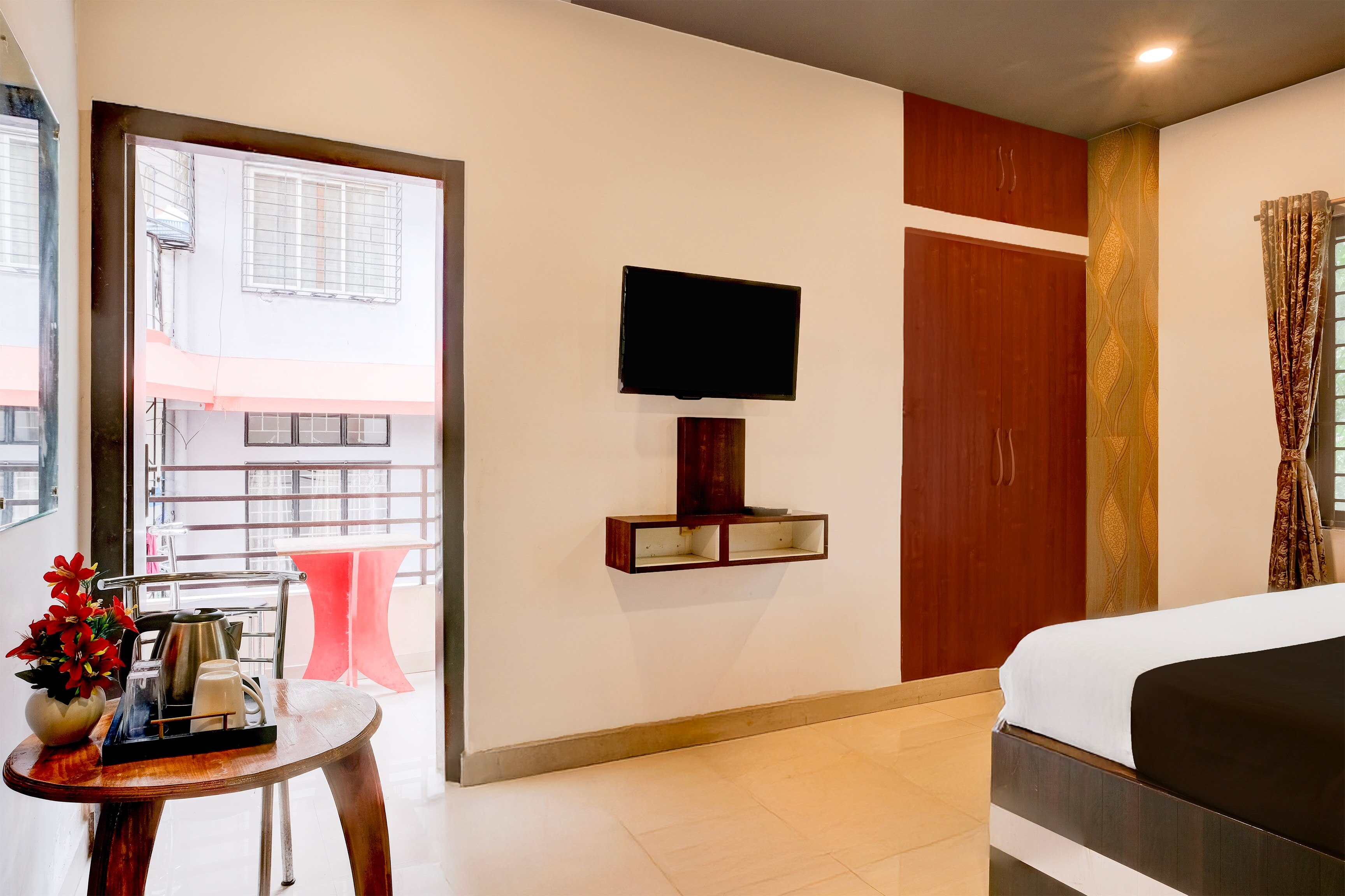 Townhouse Beltola Tiniali Formerly Hotel Pratishtha - Tap to explore photos