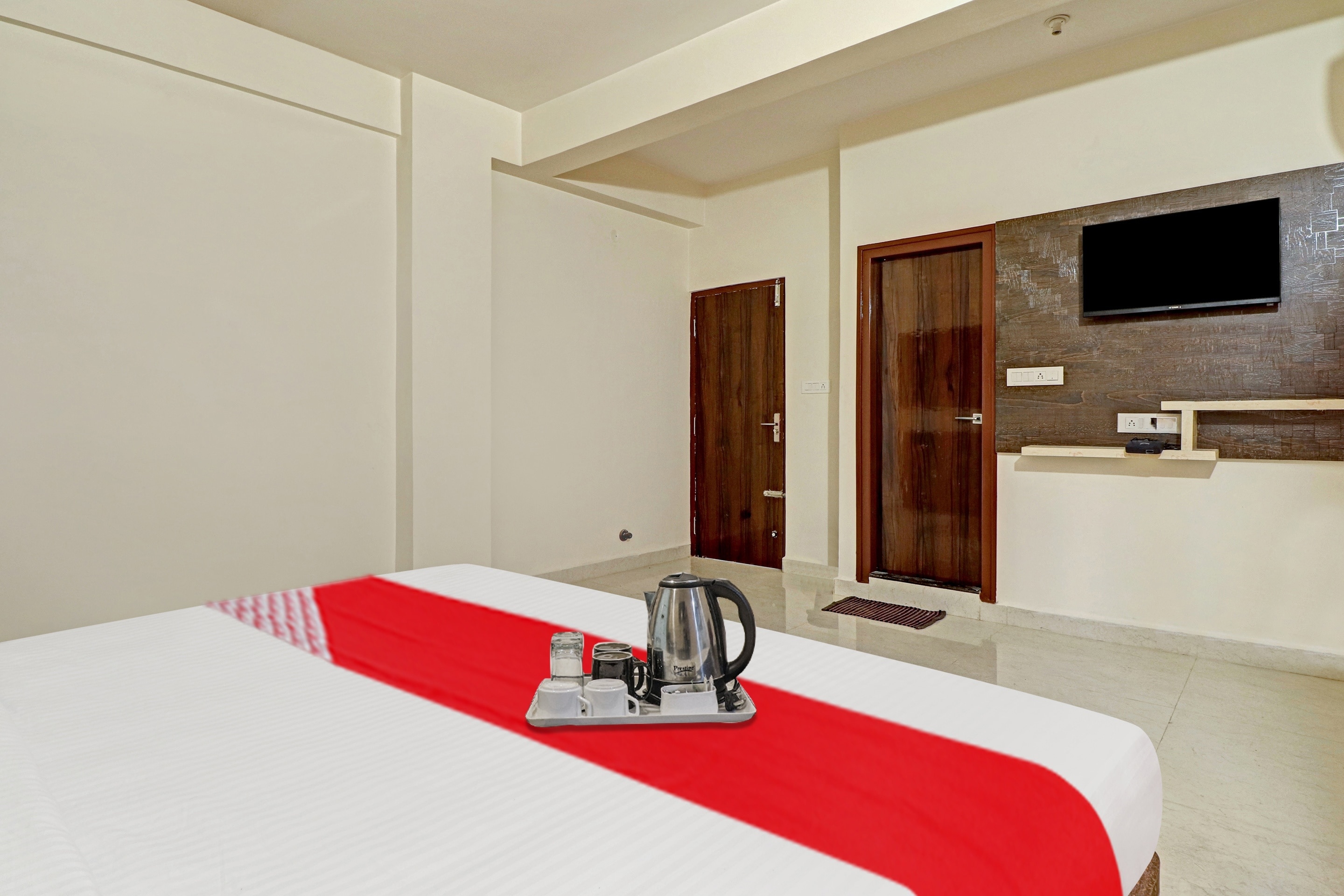 Hotel O New Town House - Tap to explore photos