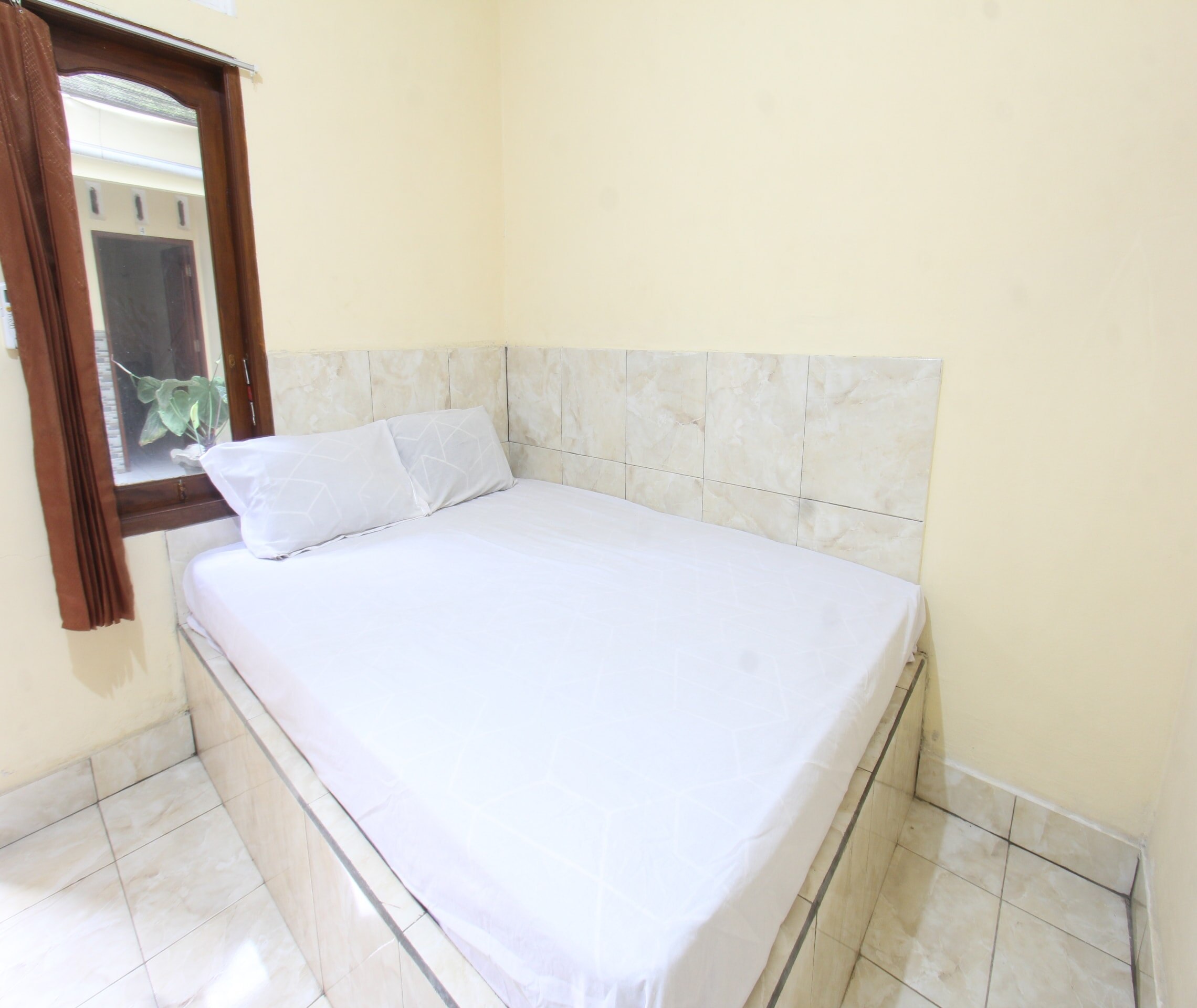 OYO 93666 Lestari Homestay - Tap to explore photos