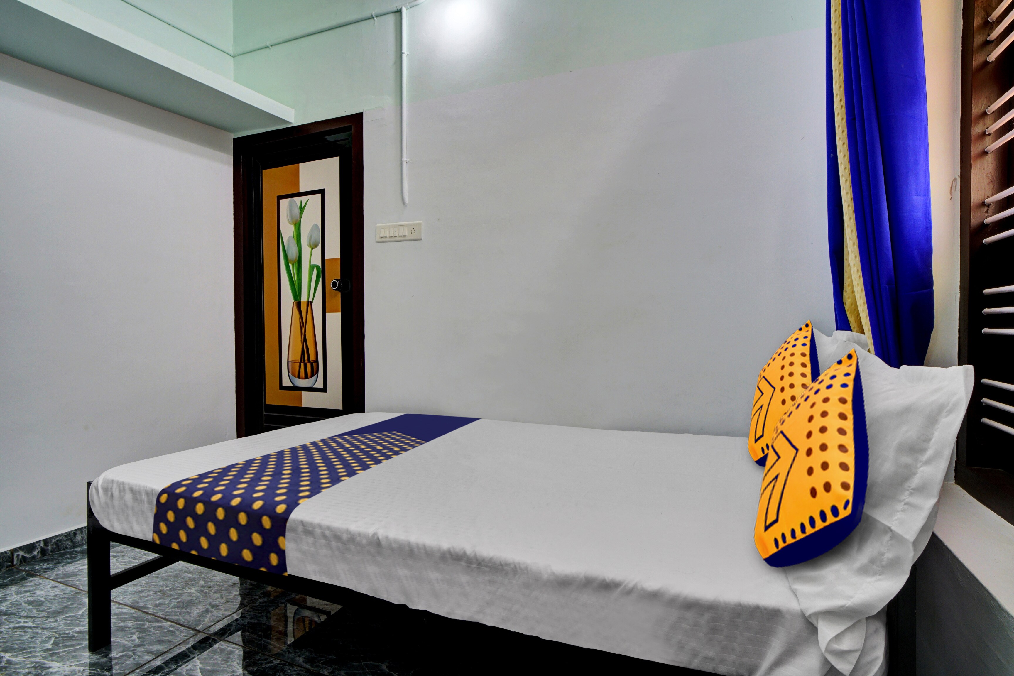 Hotel O Revathy Tourist Home - Tap to explore photos