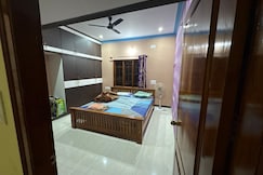 Peaceful Penthouse Retreat with Private Rooftop, Mysore