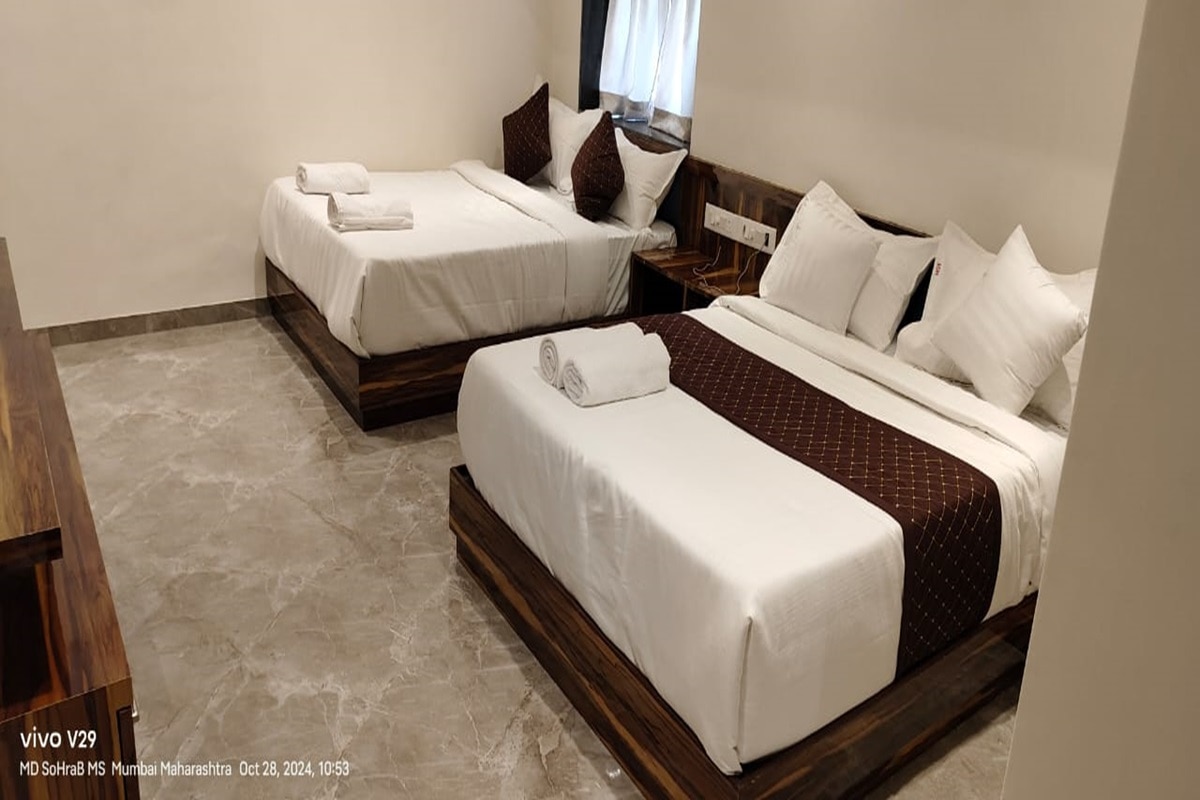 Hotel Sanjary International - Tap to explore photos