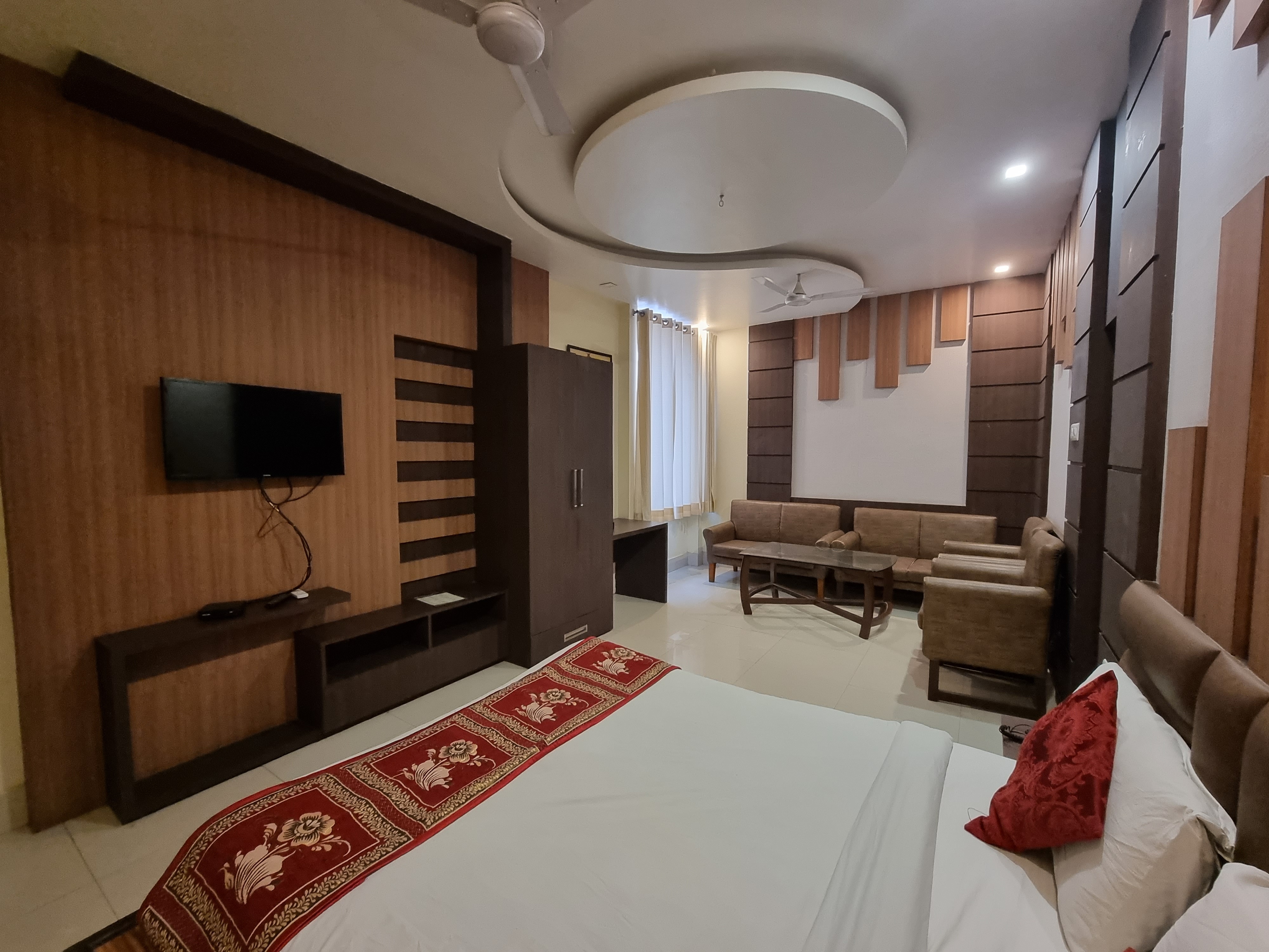 Hotel Vitthal International - Tap to explore photos