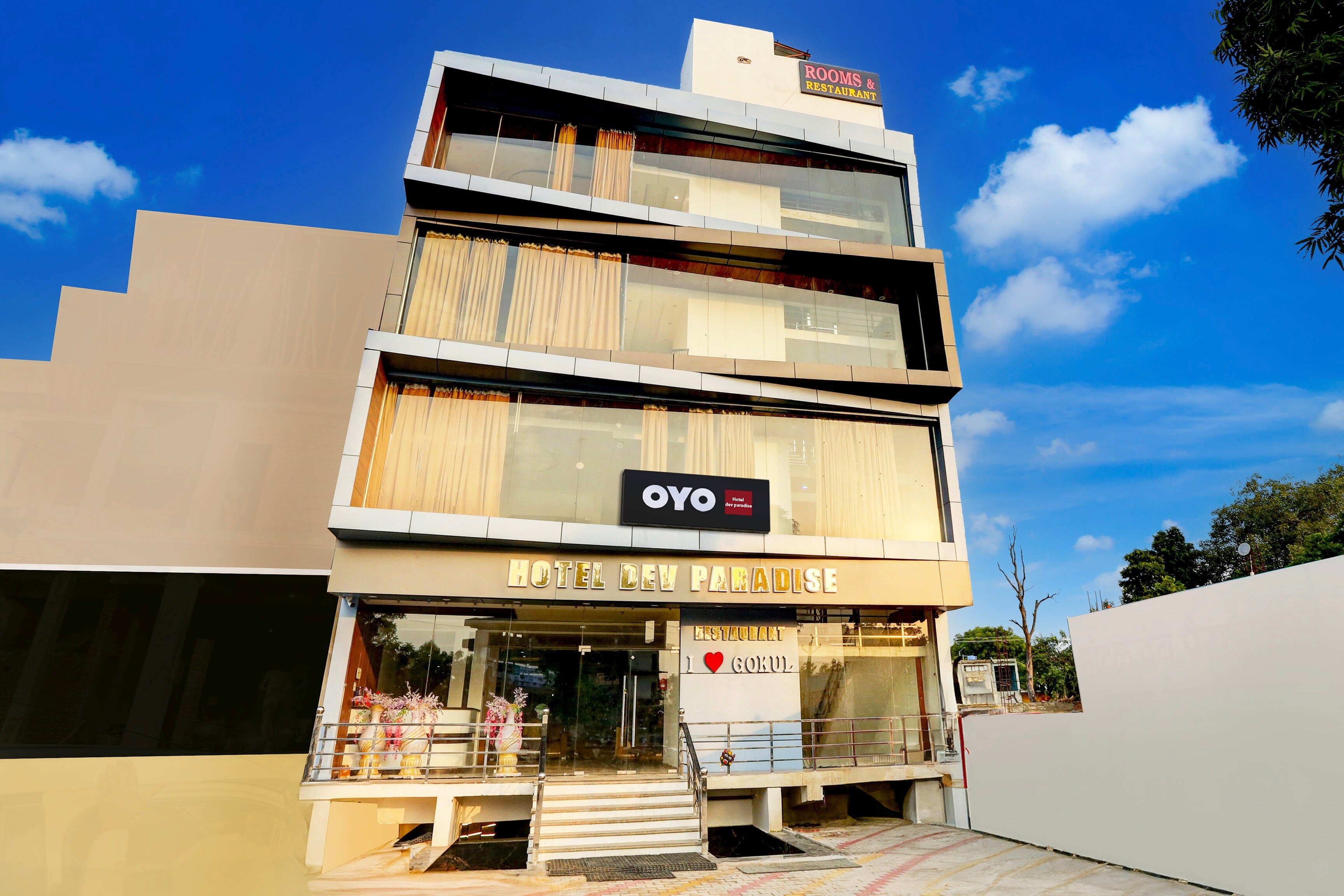 Hotel O Dev paradise - Tap to explore photos
