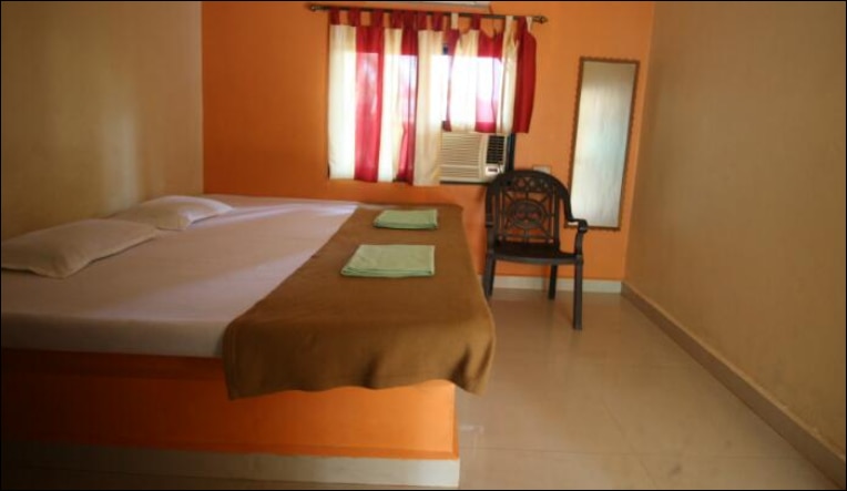 Non AC Room with non attached bathroom & fan 1