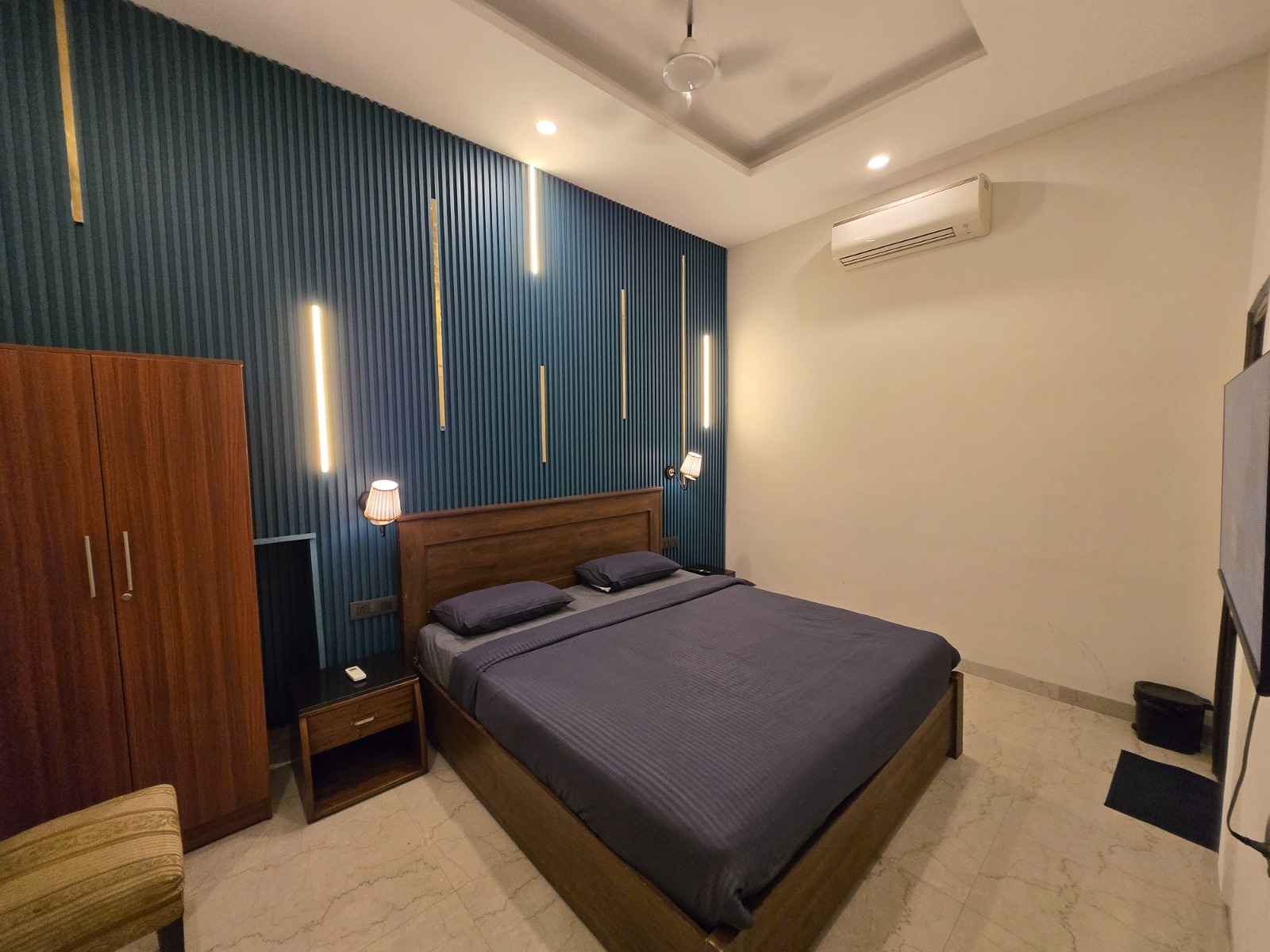 The True Host Suites - Tap to explore photos