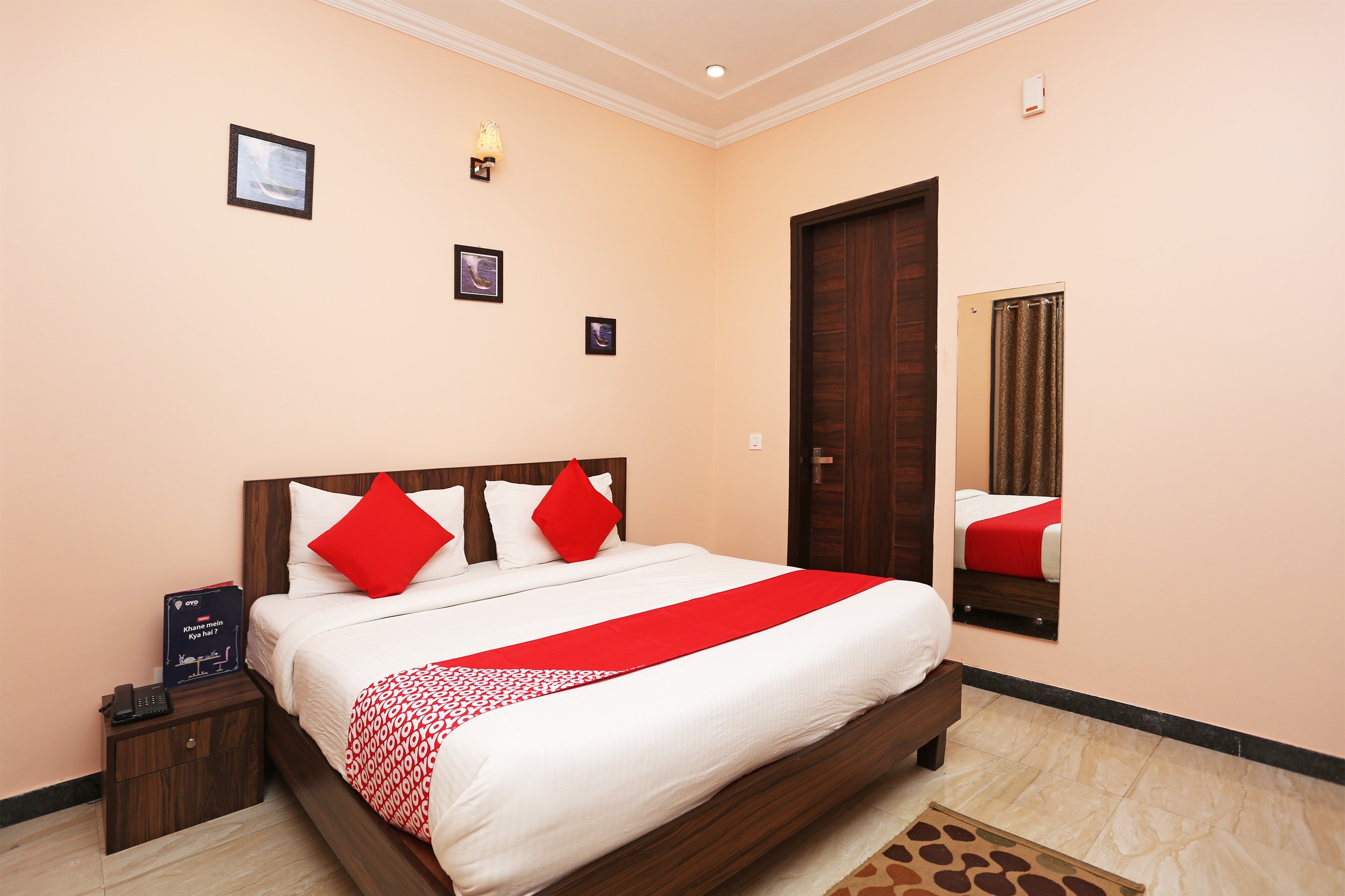 Hotel O VAAS One Thirty Two - Tap to explore photos