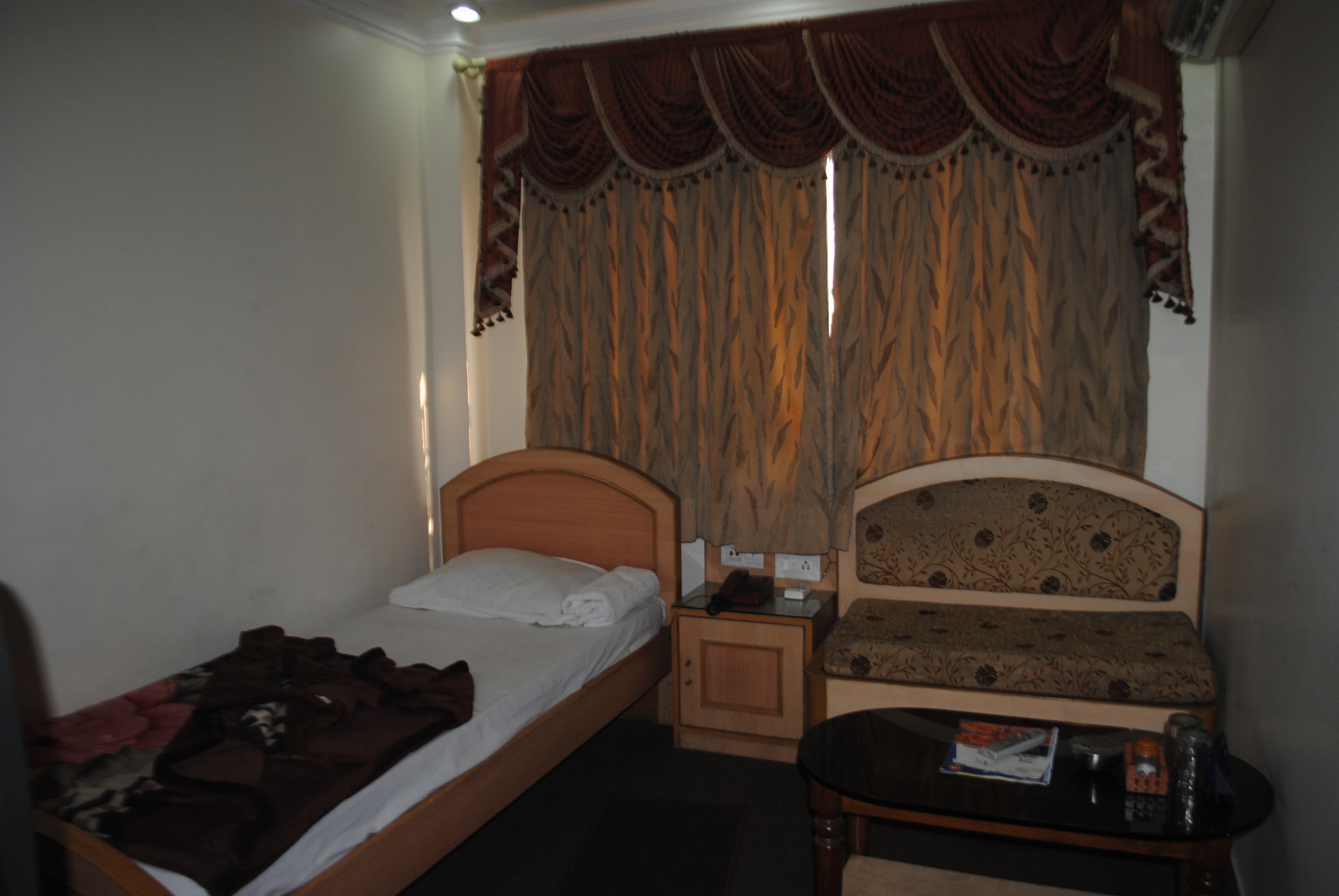Hotel Radha International - Tap to explore photos