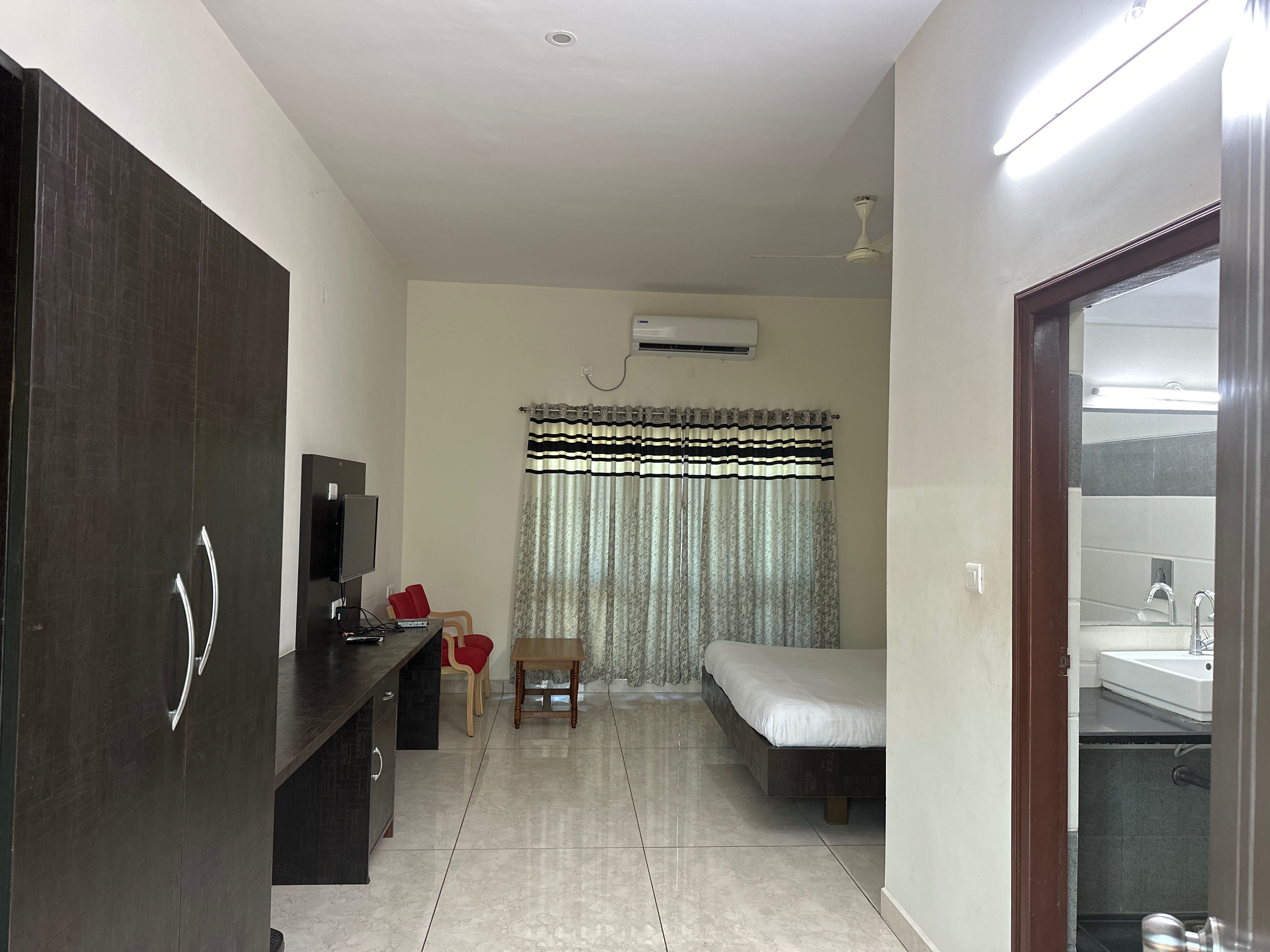Super Hotel O SAR Residency - Tap to explore photos