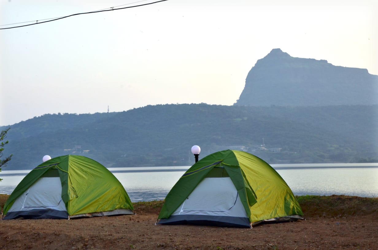 Iland pawana lake camping - Tap to explore photos