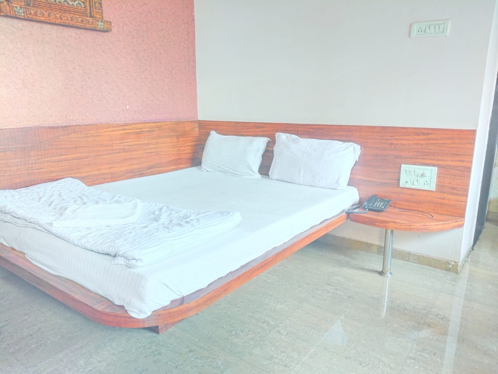 Hotel Sai Jharna - Tap to explore photos