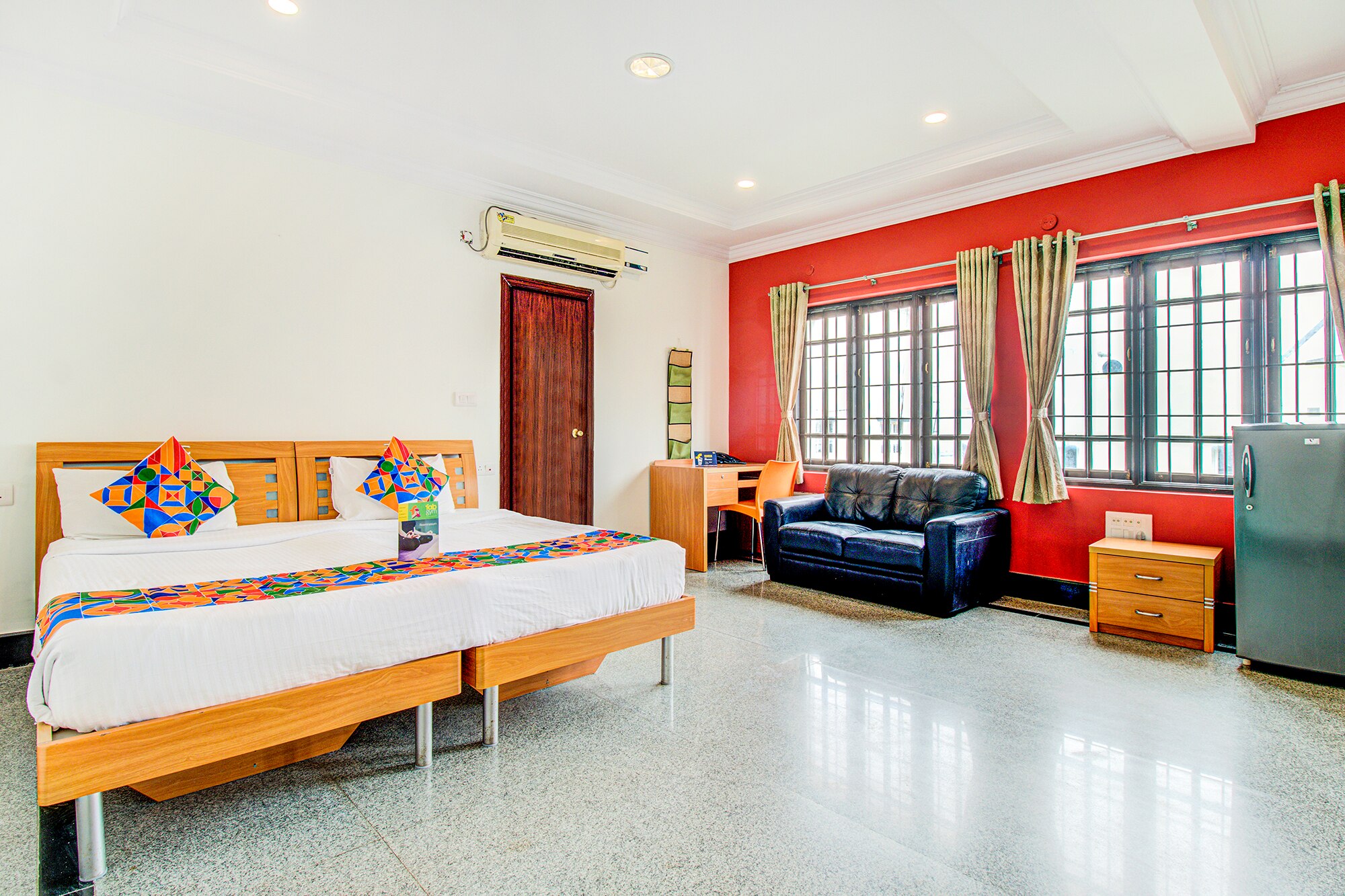 FabHotel Emara Grand - Tap to explore photos