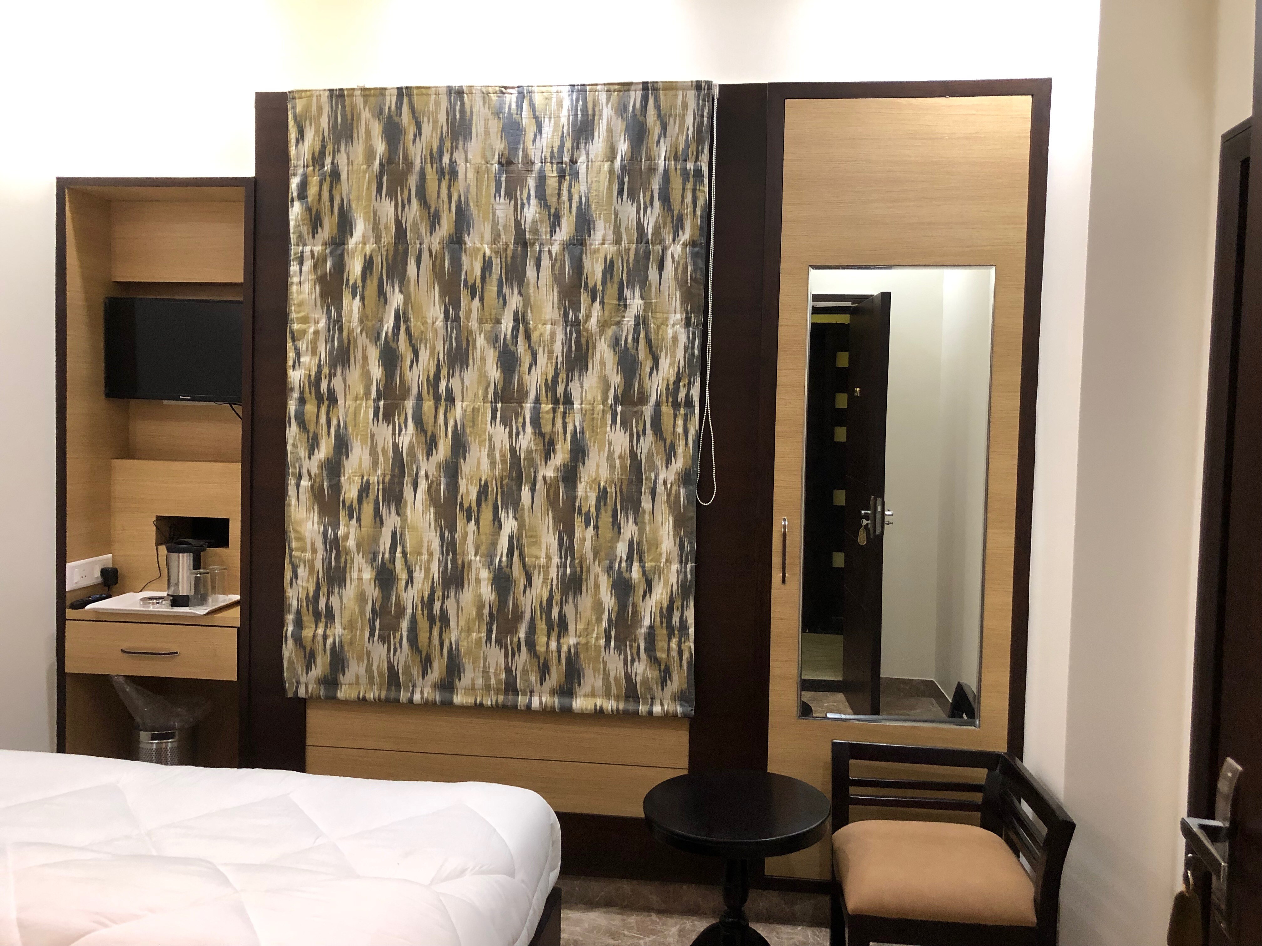 Allure Inn - Tap to explore photos