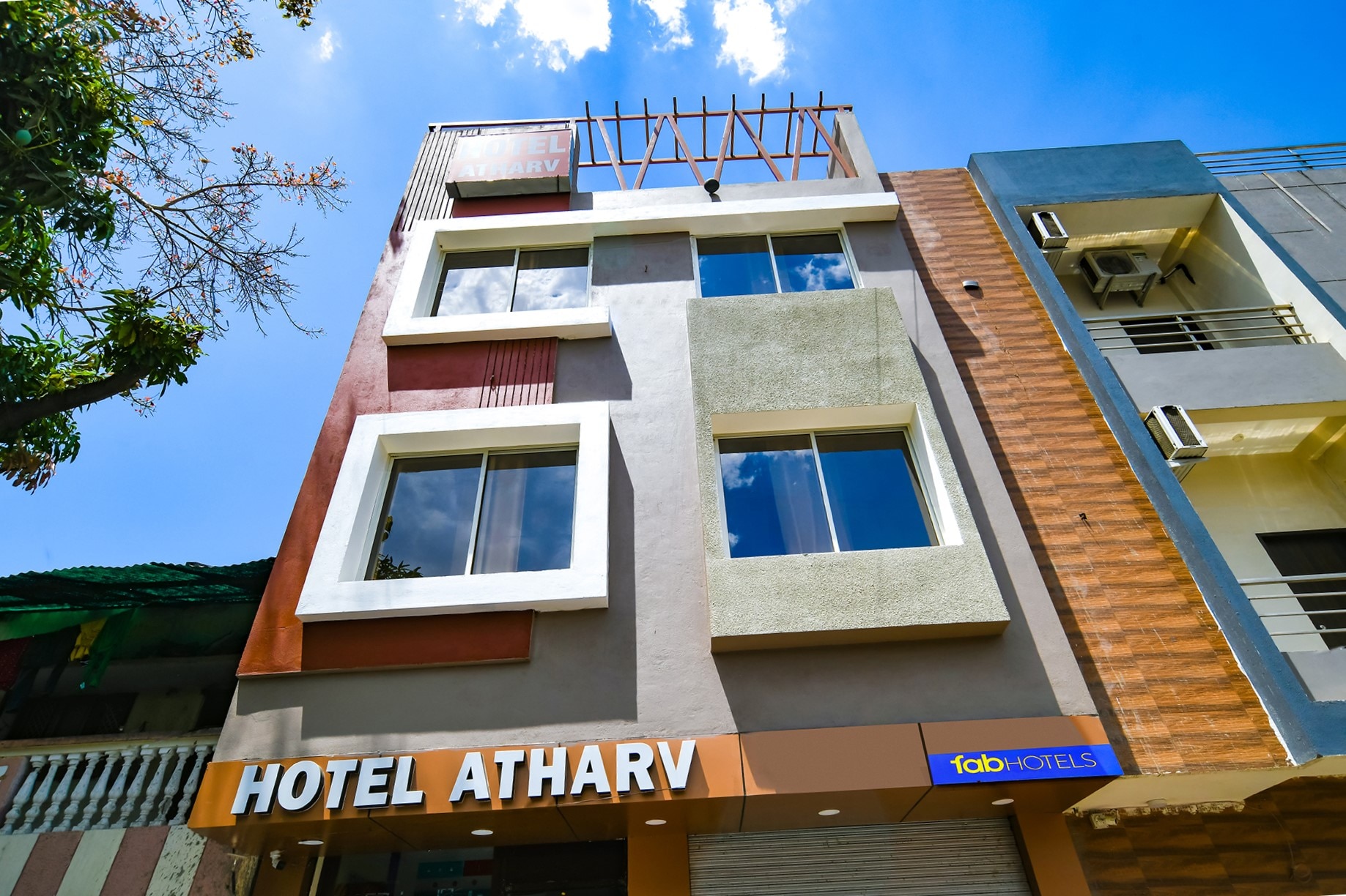 FabHotel Atharv - Tap to explore photos