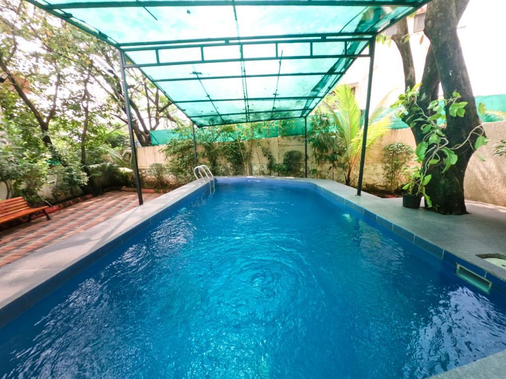 Atharv Villa Rooms - Tap to explore photos