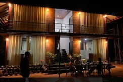 Tranquil glass house by Coorg Tree House, Coorg