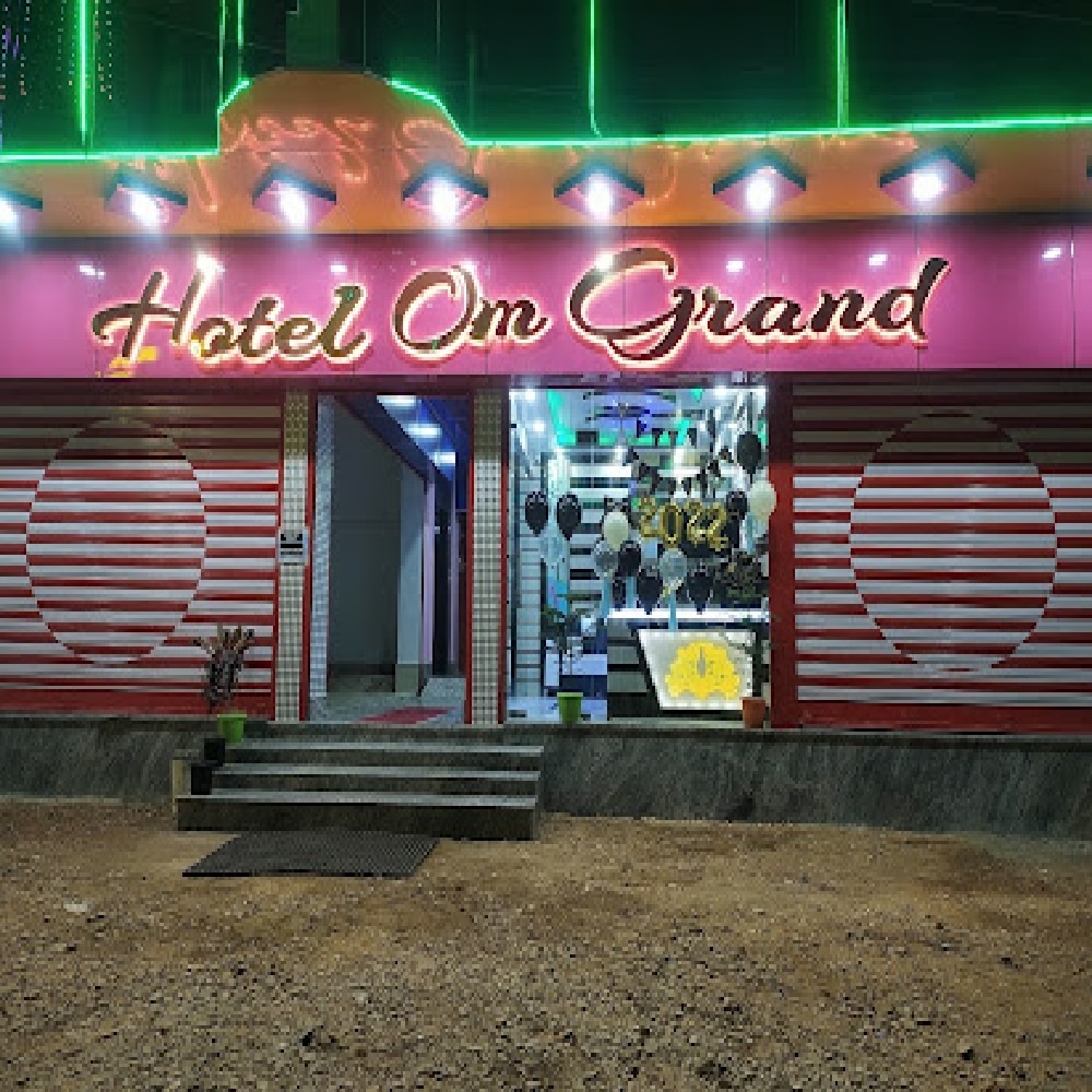 HOTEL OM GRAND - Tap to explore photos
