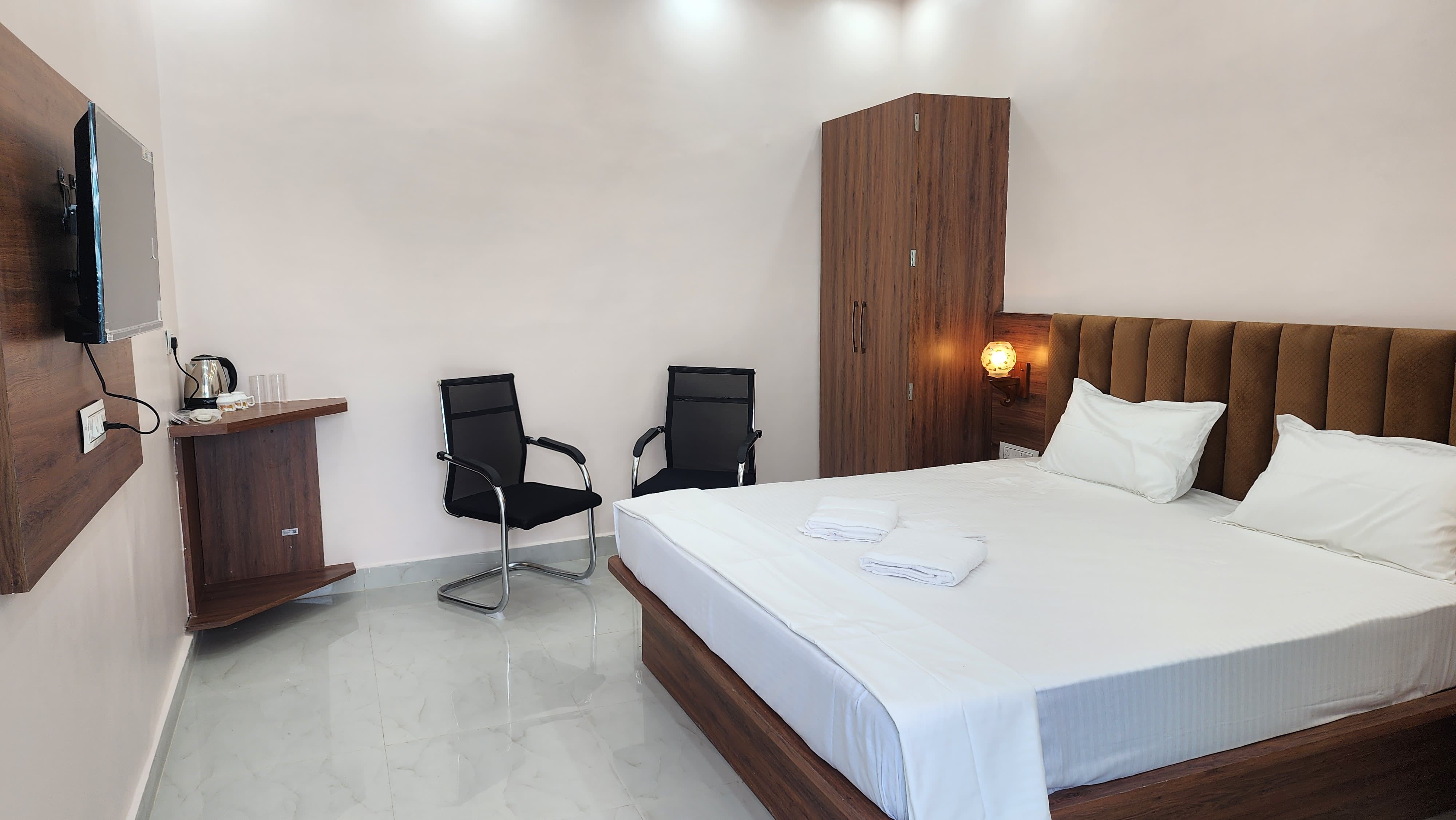 Hotel Nilayam Inn - Tap to explore photos