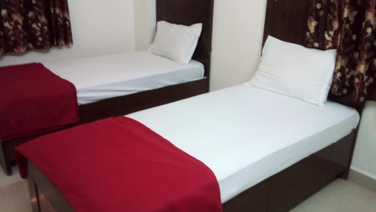 Amogha Guest house - Tap to explore photos
