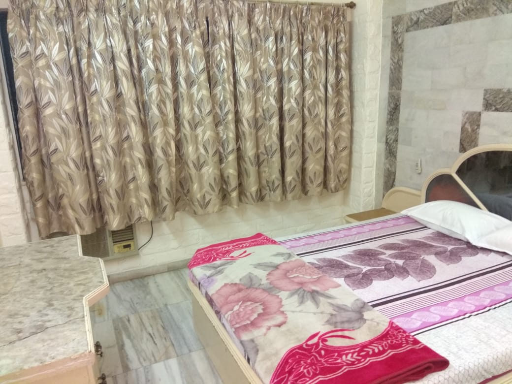 Navin Mohan 1bhk apartment - Tap to explore photos
