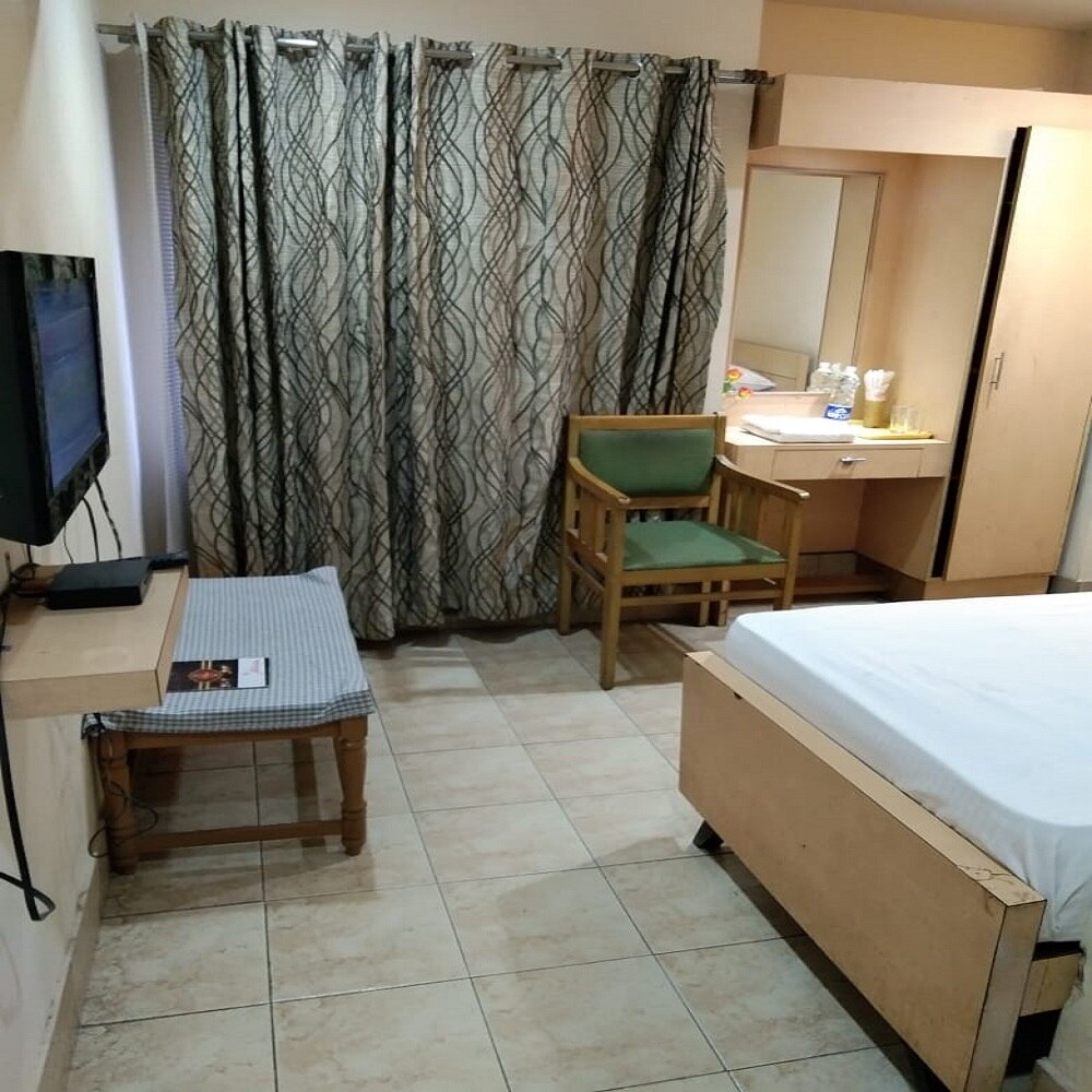 Hotel Amrutha - Tap to explore photos