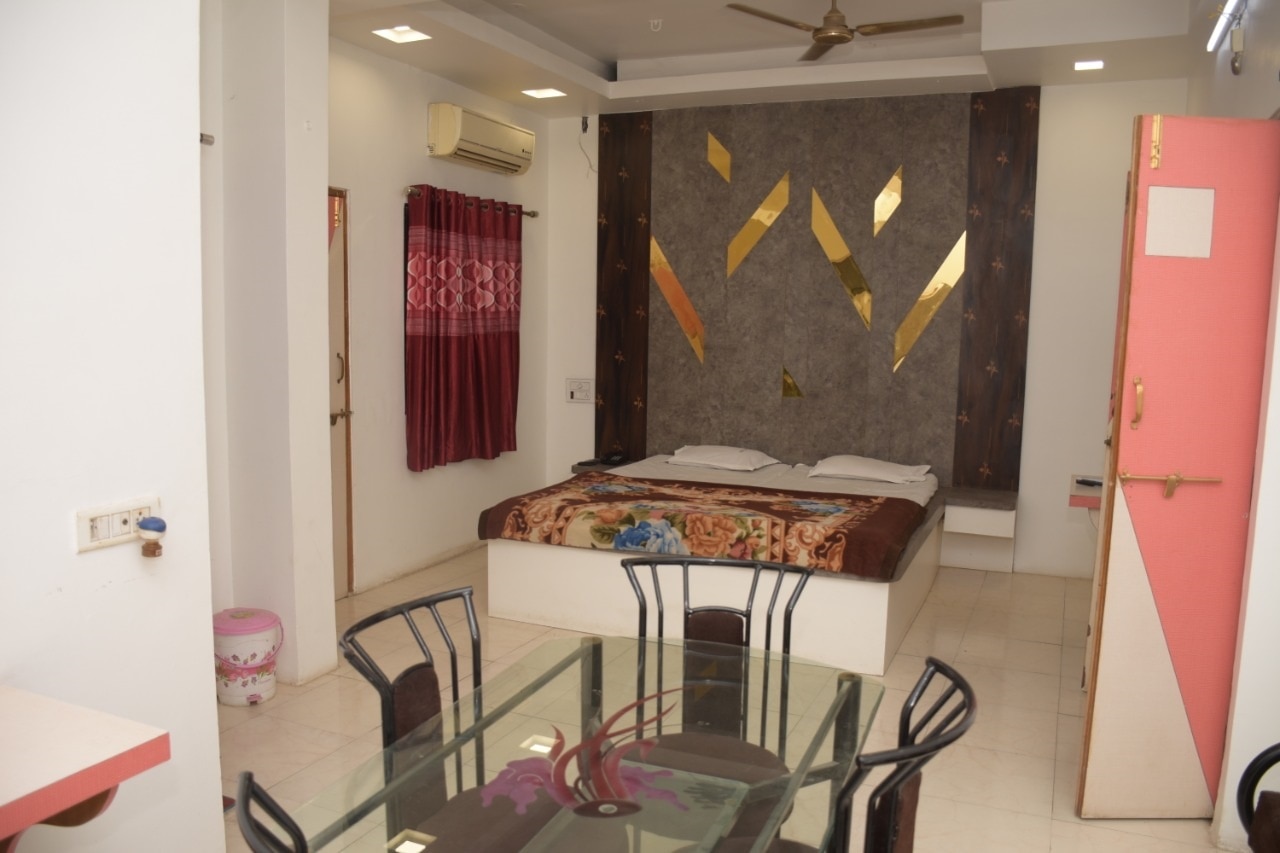 Shrimaya Hotel - Tap to explore photos
