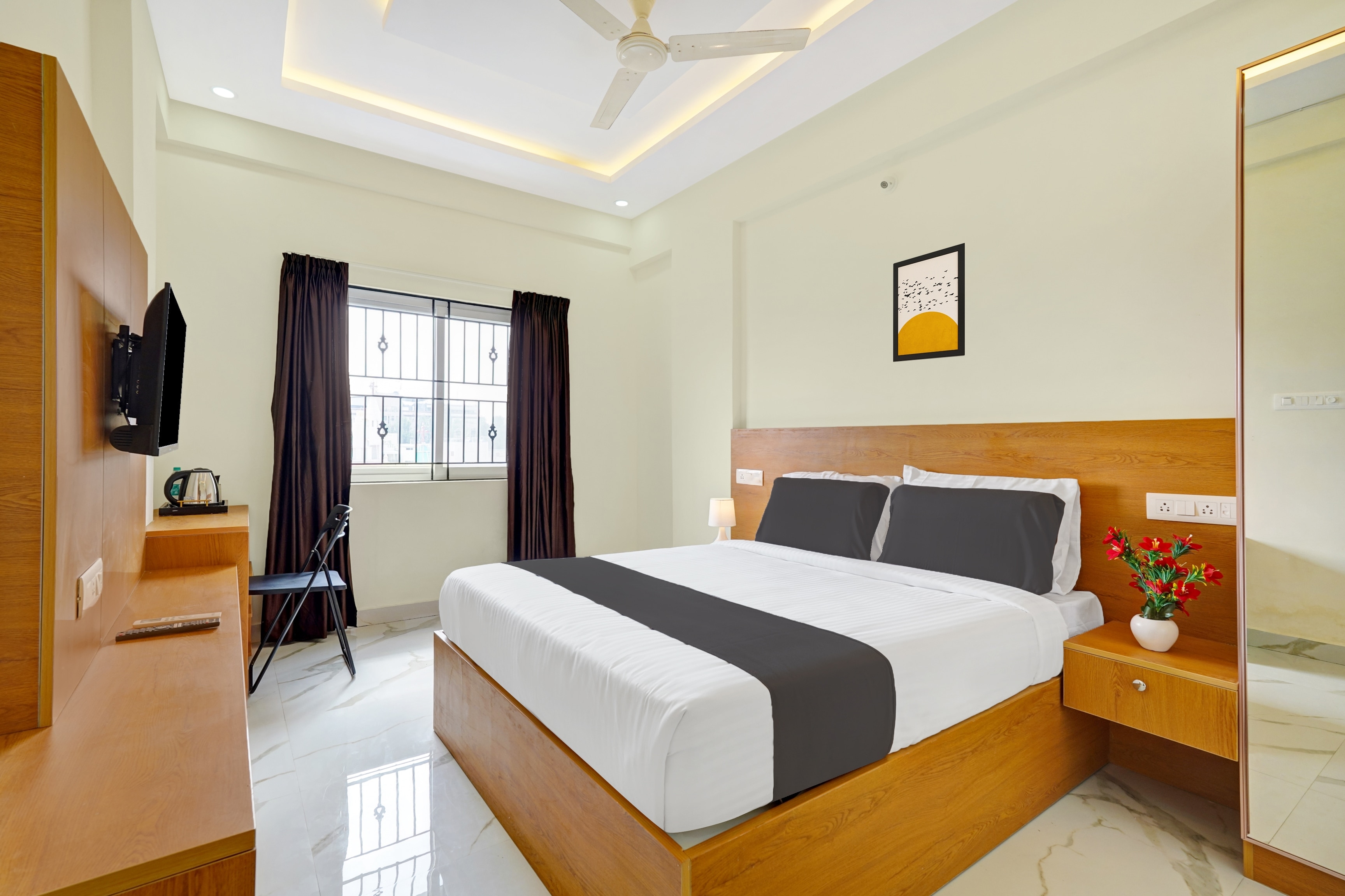 Collection O White Suites-Kemp Fort mall - Tap to explore photos