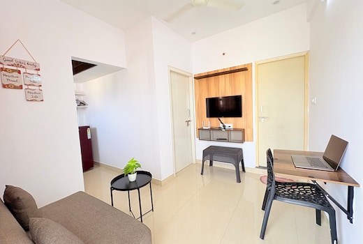 Compact Haralur Apartment by ANI Living Spaces