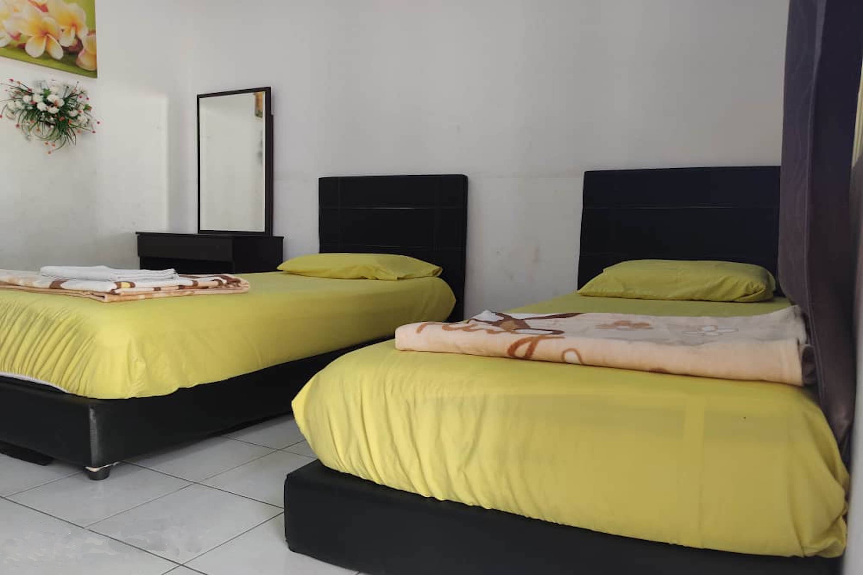 OYO 90289 Taman Kota Homestay - Tap to explore photos