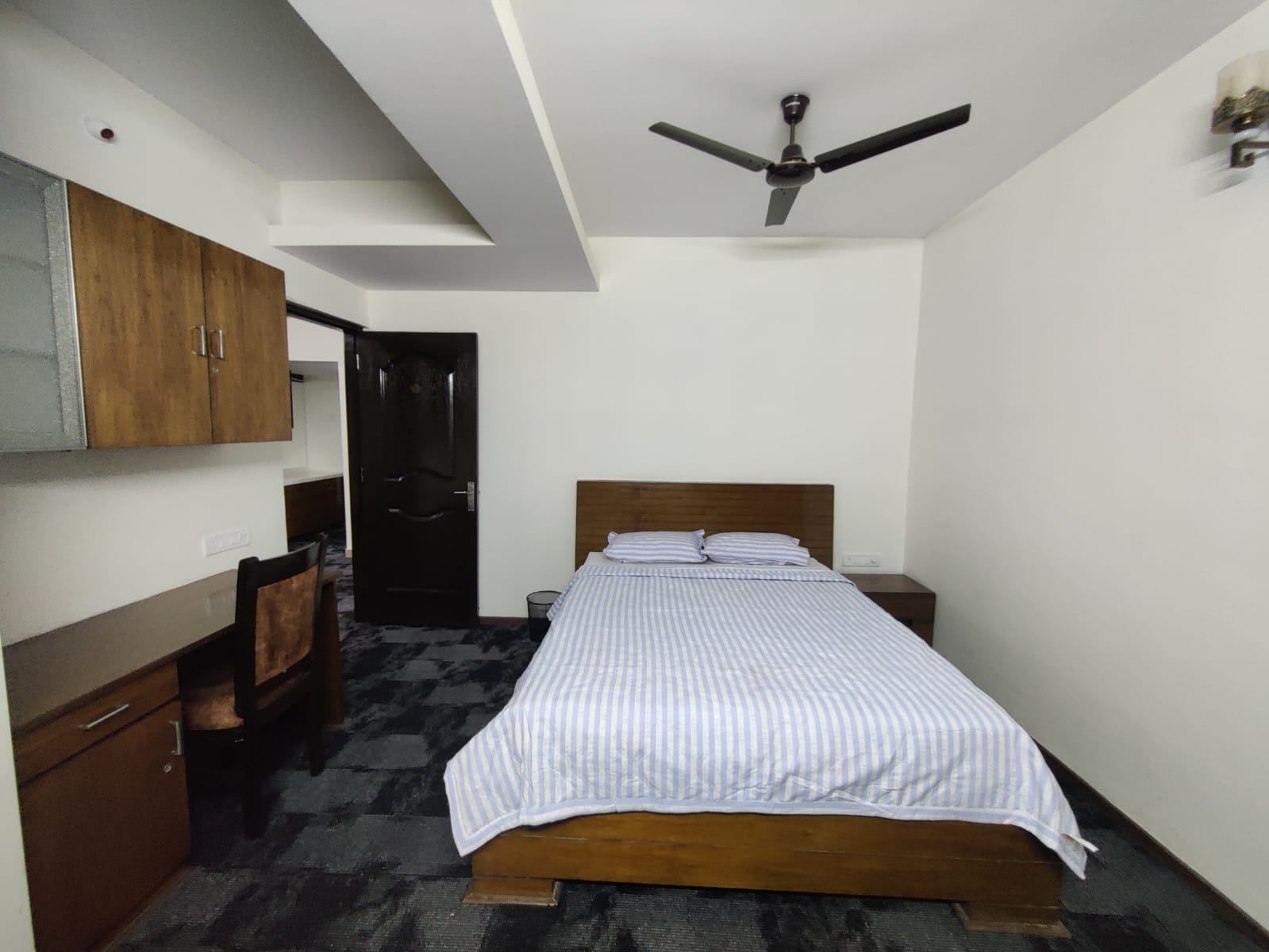Shri Kudil Home Stay Bedroom 1 - Tap to explore photos