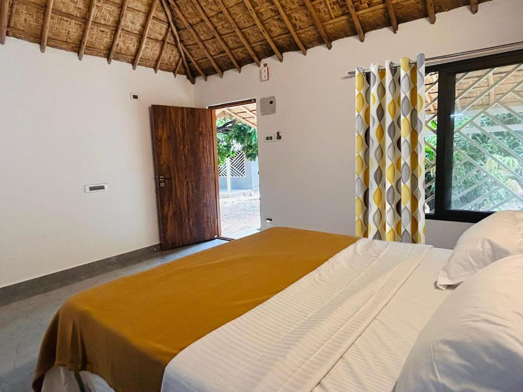Hampi Village Resort & Tutti Cafe - Tap to explore photos