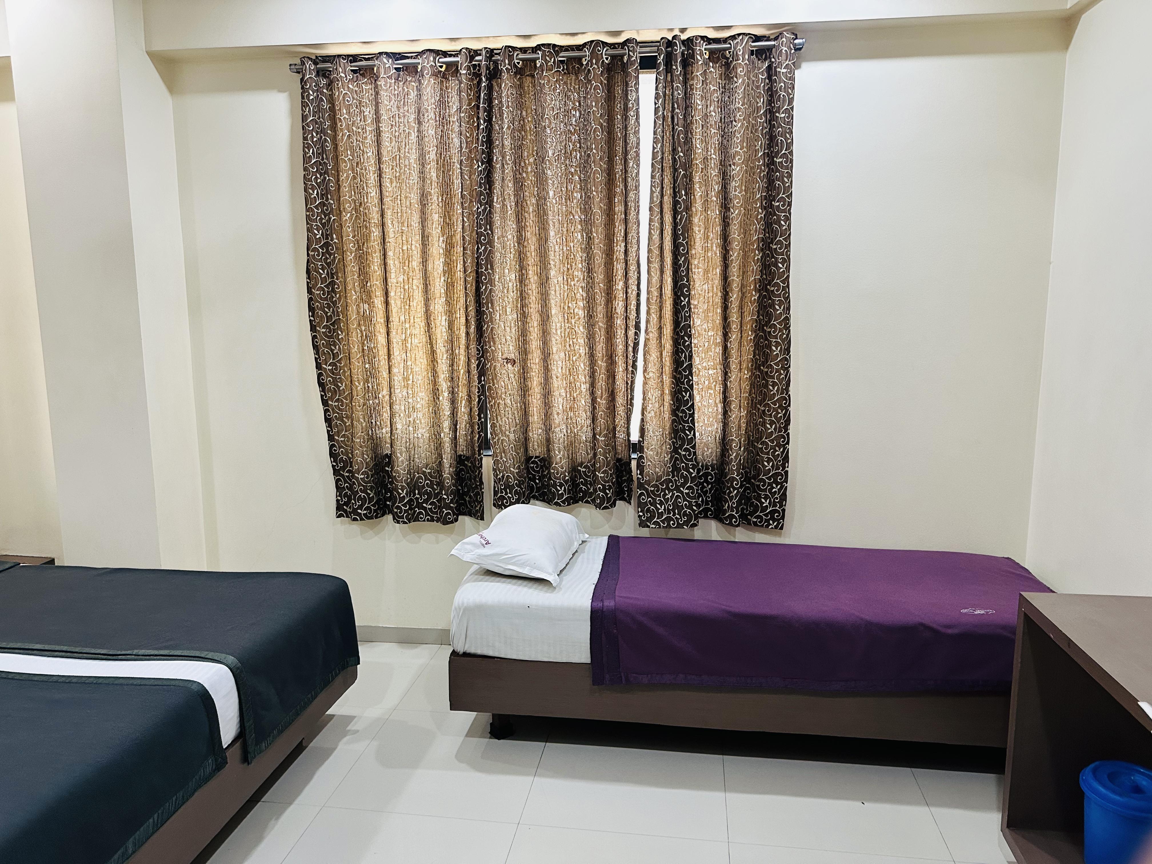 Hotel Archana - Tap to explore photos