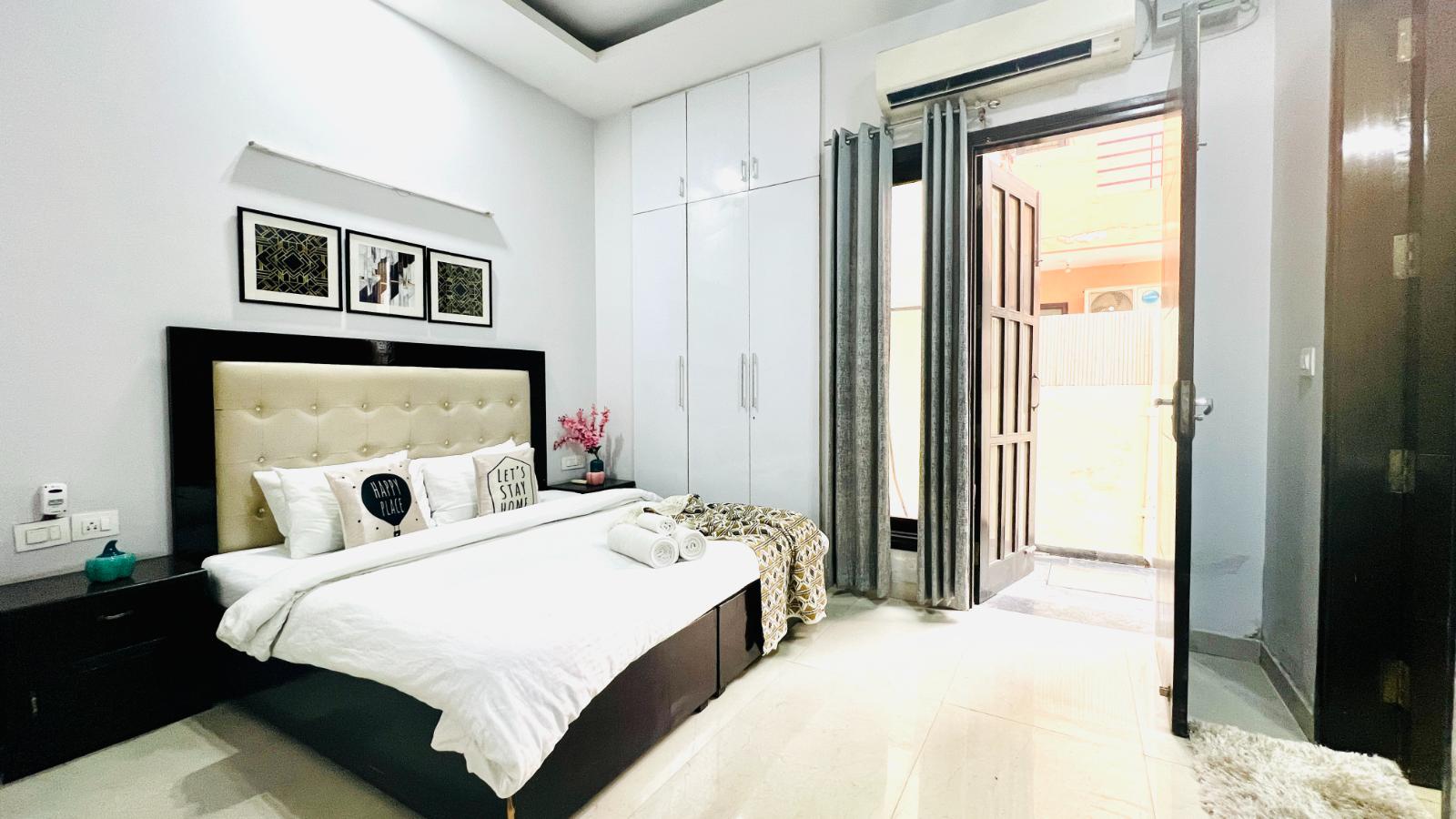 Entire 1BHK Apartment by Bluo at DLF Galleria Market - Tap to explore photos