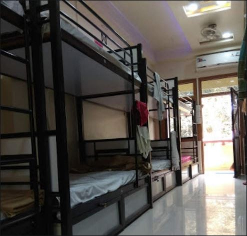 Hotel Sai Ram dormitory - Tap to explore photos