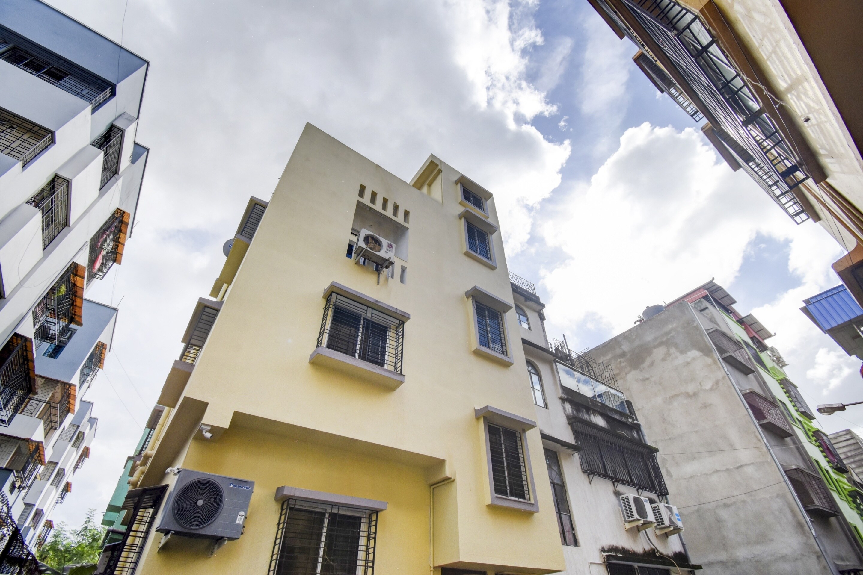 Super Hotel O Ankita Guest House - Tap to explore photos