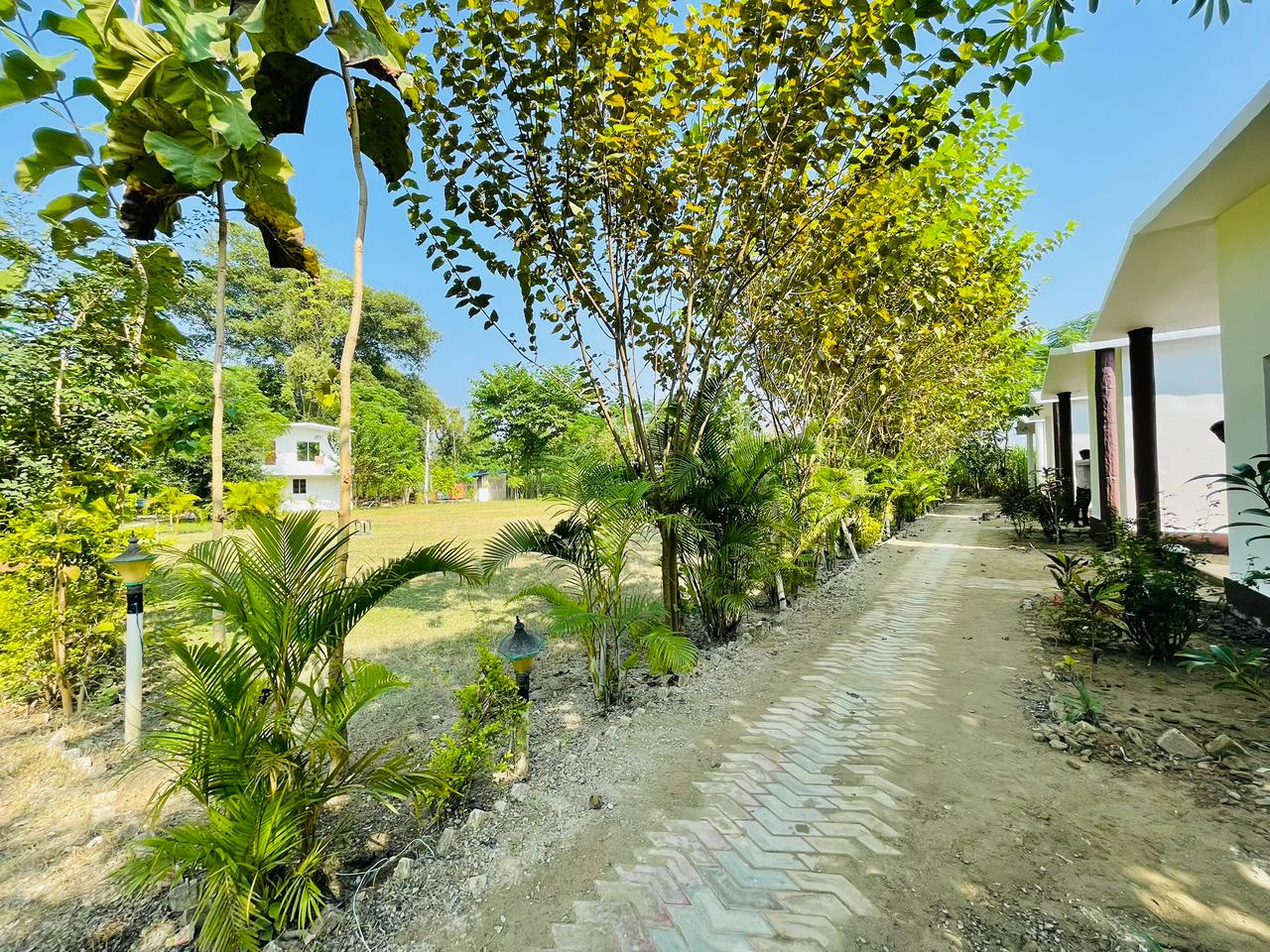 Earth Home Katarniaghat - Tap to explore photos