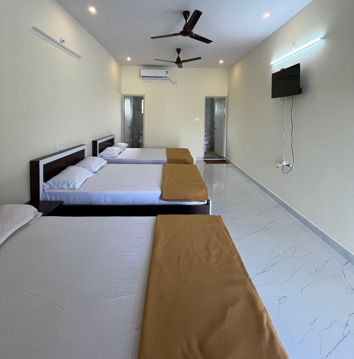 Sriram guest House - Tap to explore photos