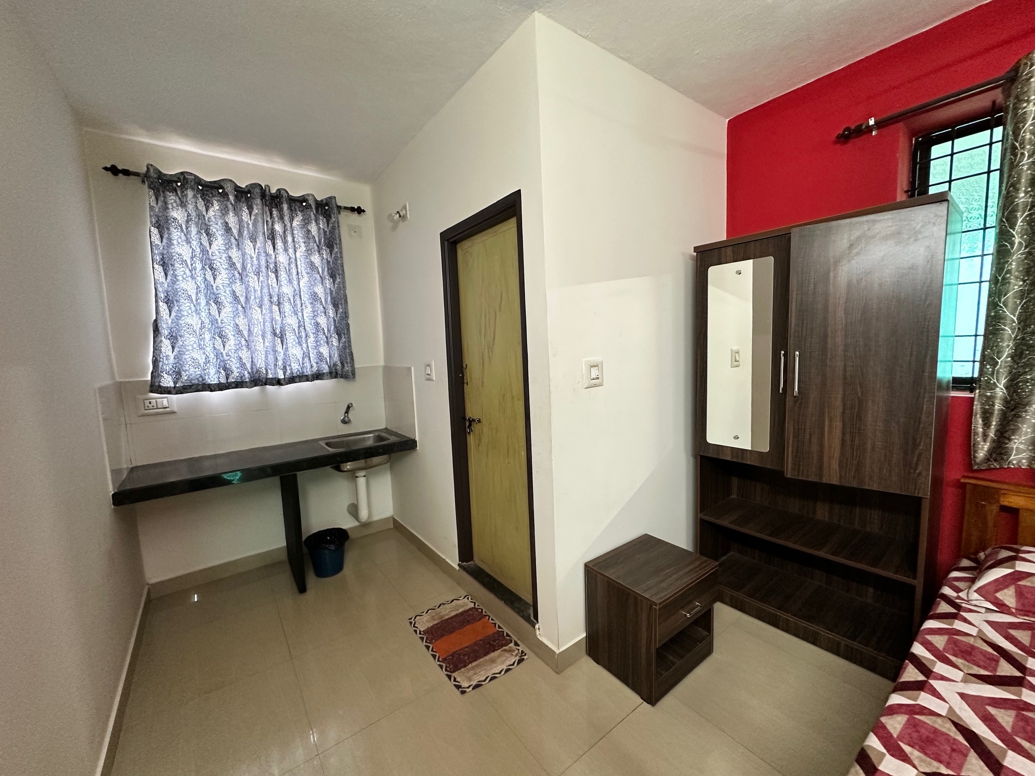 Janani Rooms - Tap to explore photos