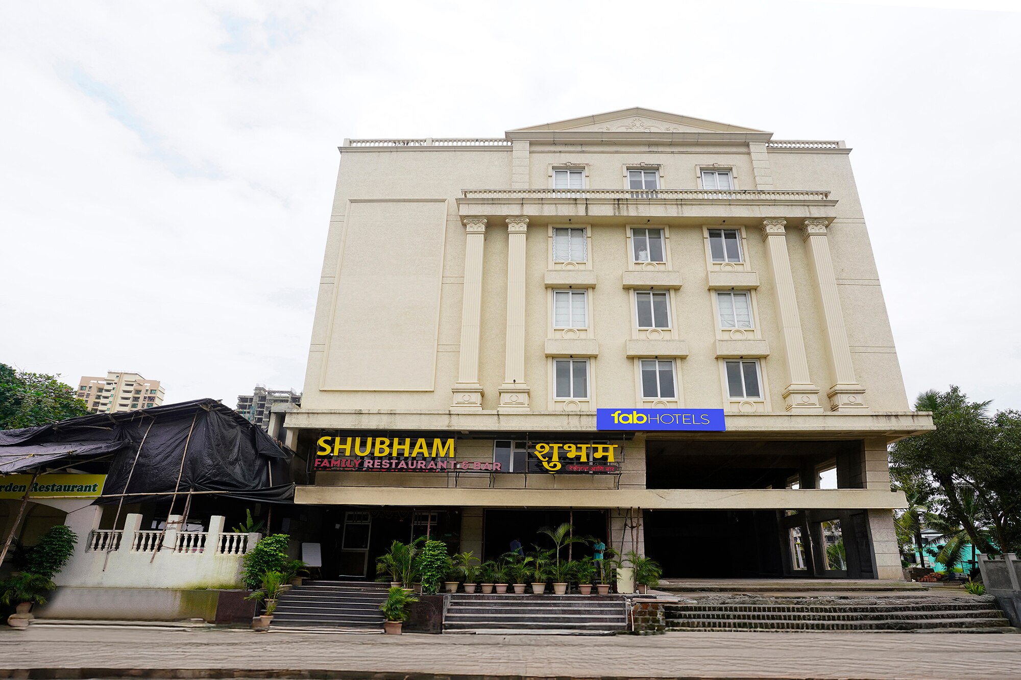 FabHotel Prime Shubham Comforts - Tap to explore photos