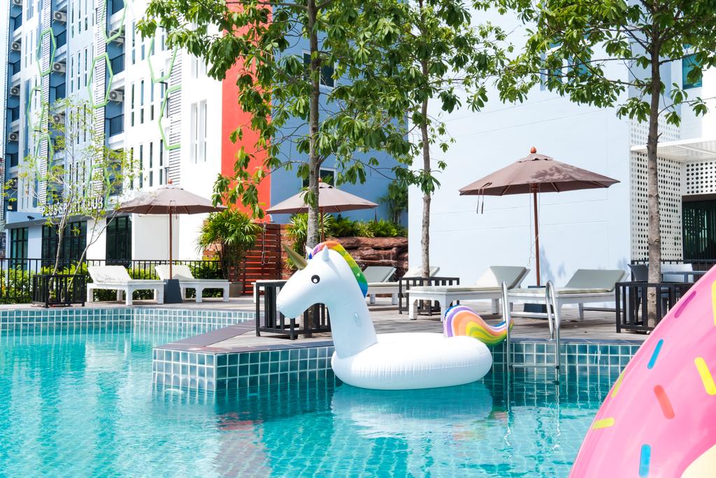 P Plus Hotel - Tap to explore photos