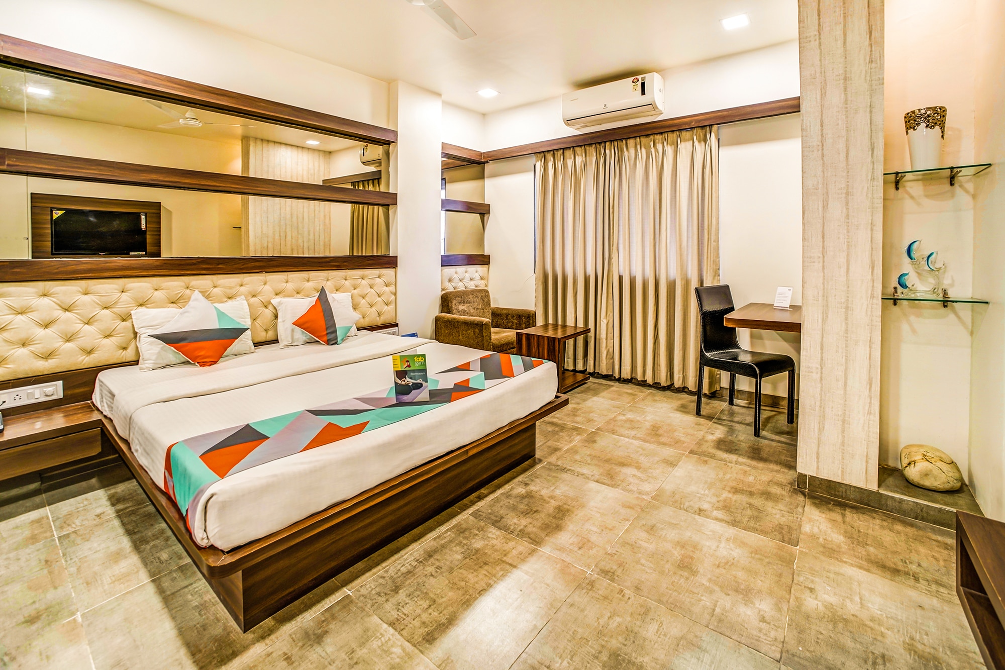 FabHotel Global Inn - Nr. Sanjeevani Children's Hospital - Tap to explore photos