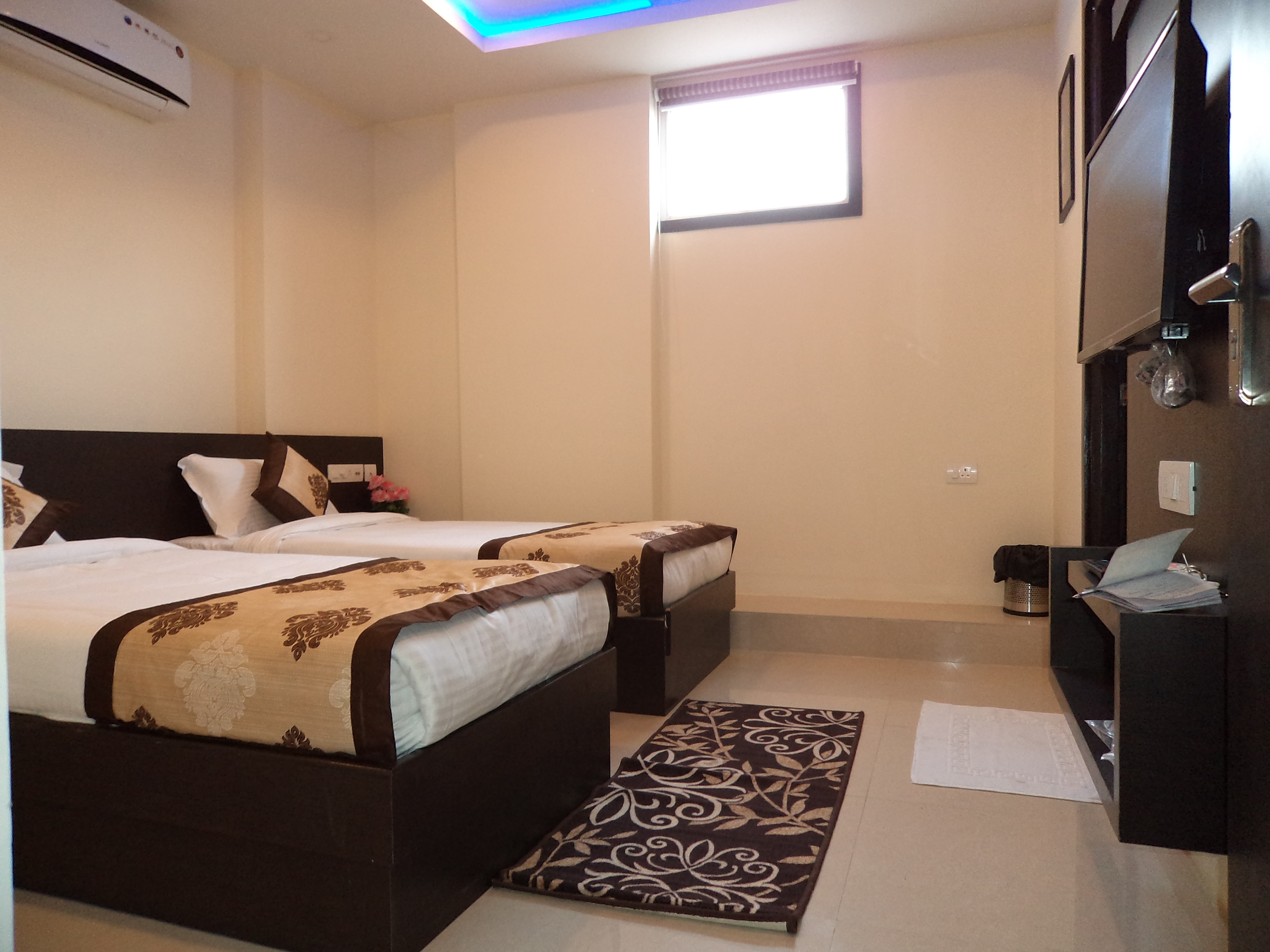 Ashu Hotels - Tap to explore photos
