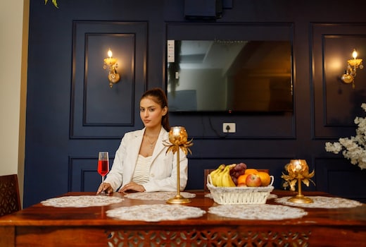 Cinematic Luxury: 3BHK Serviced Apartment with Home Theatre