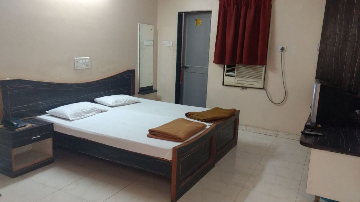 Hotel Radhika - Tap to explore photos