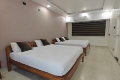 The Palm and Stream Quadruple room with balcony, Coimbatore