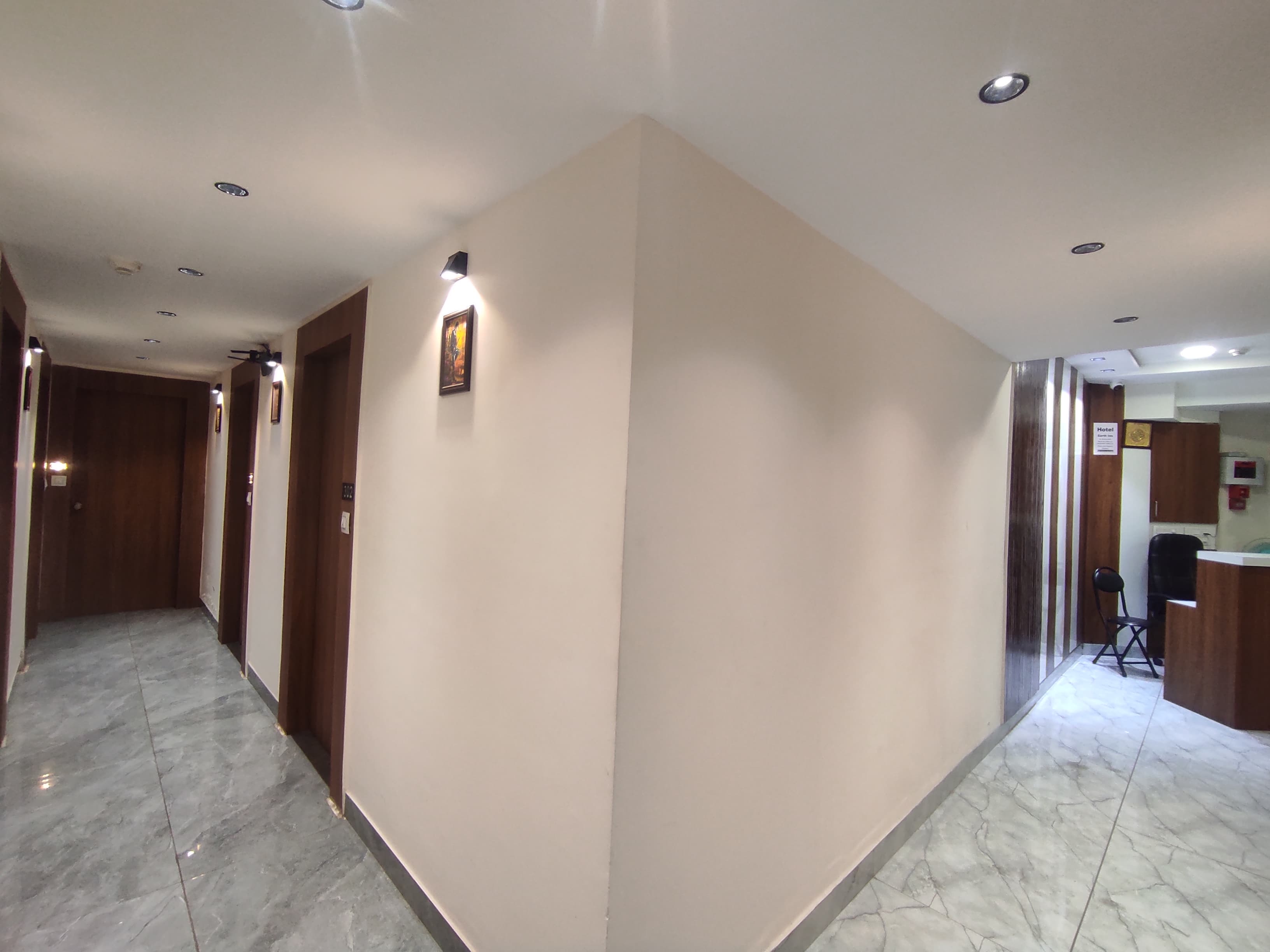 Hotel Earth Inn, Subhash Bridge, Ahmedabad - Tap to explore photos