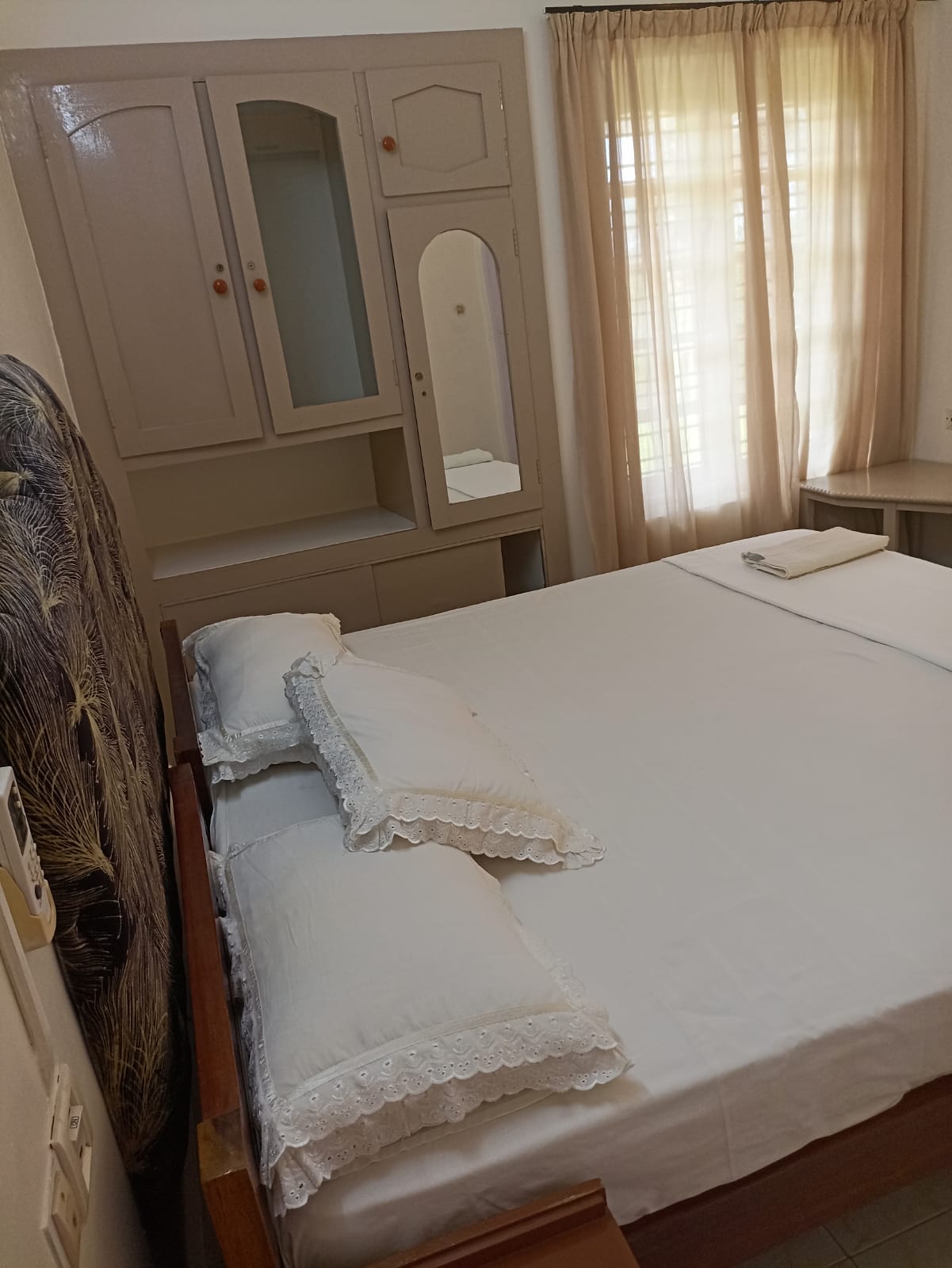 Thushara Room in a Homestay - Tap to explore photos