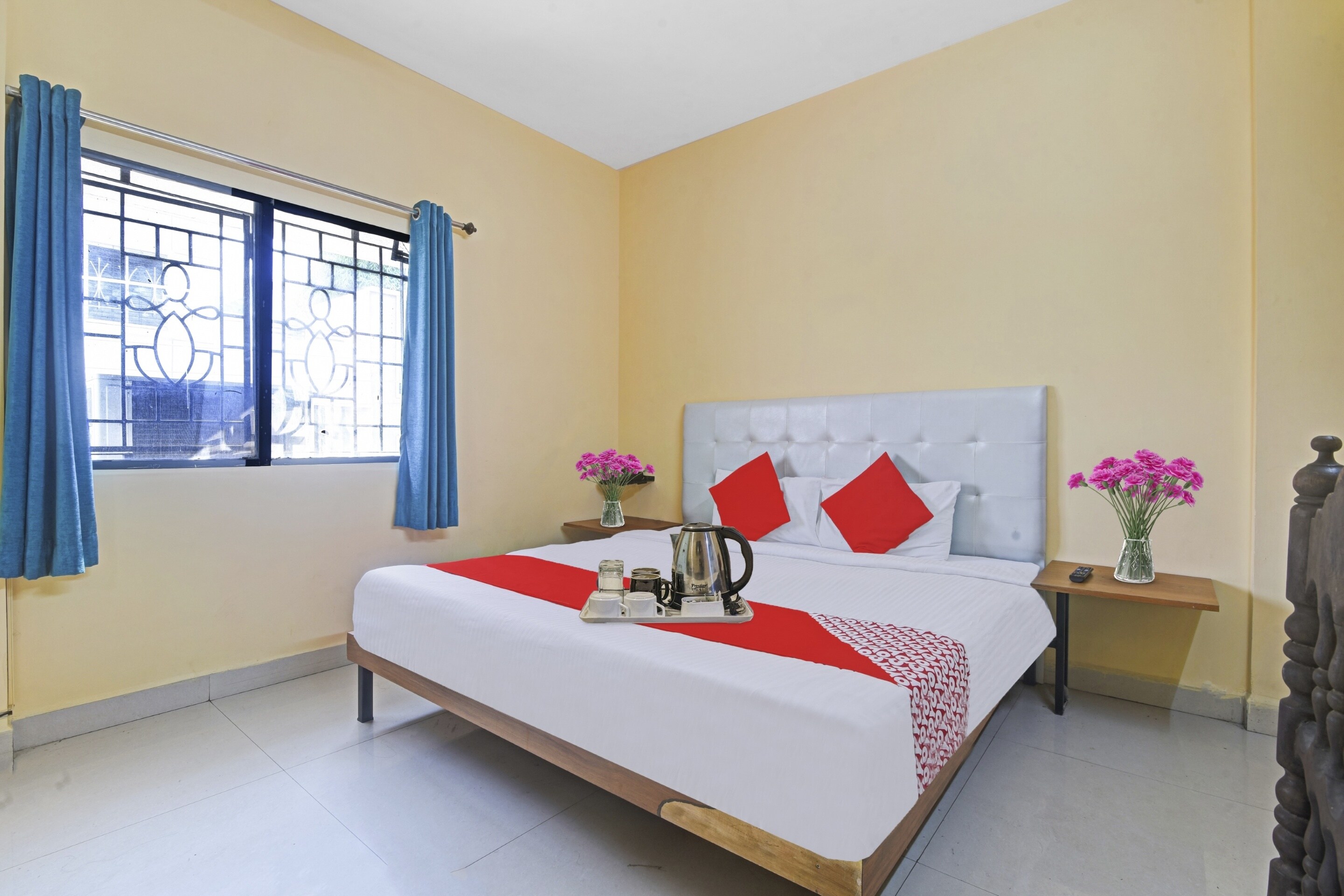 Super Hotel O Ocsa Inn - Tap to explore photos