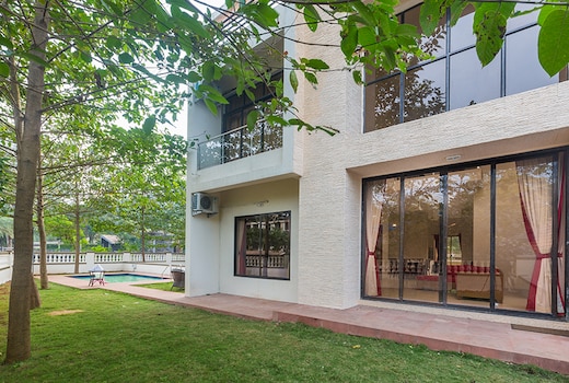 StayVista at Greenwoods 9 Villa with Private Pool & Ping-Pong Table